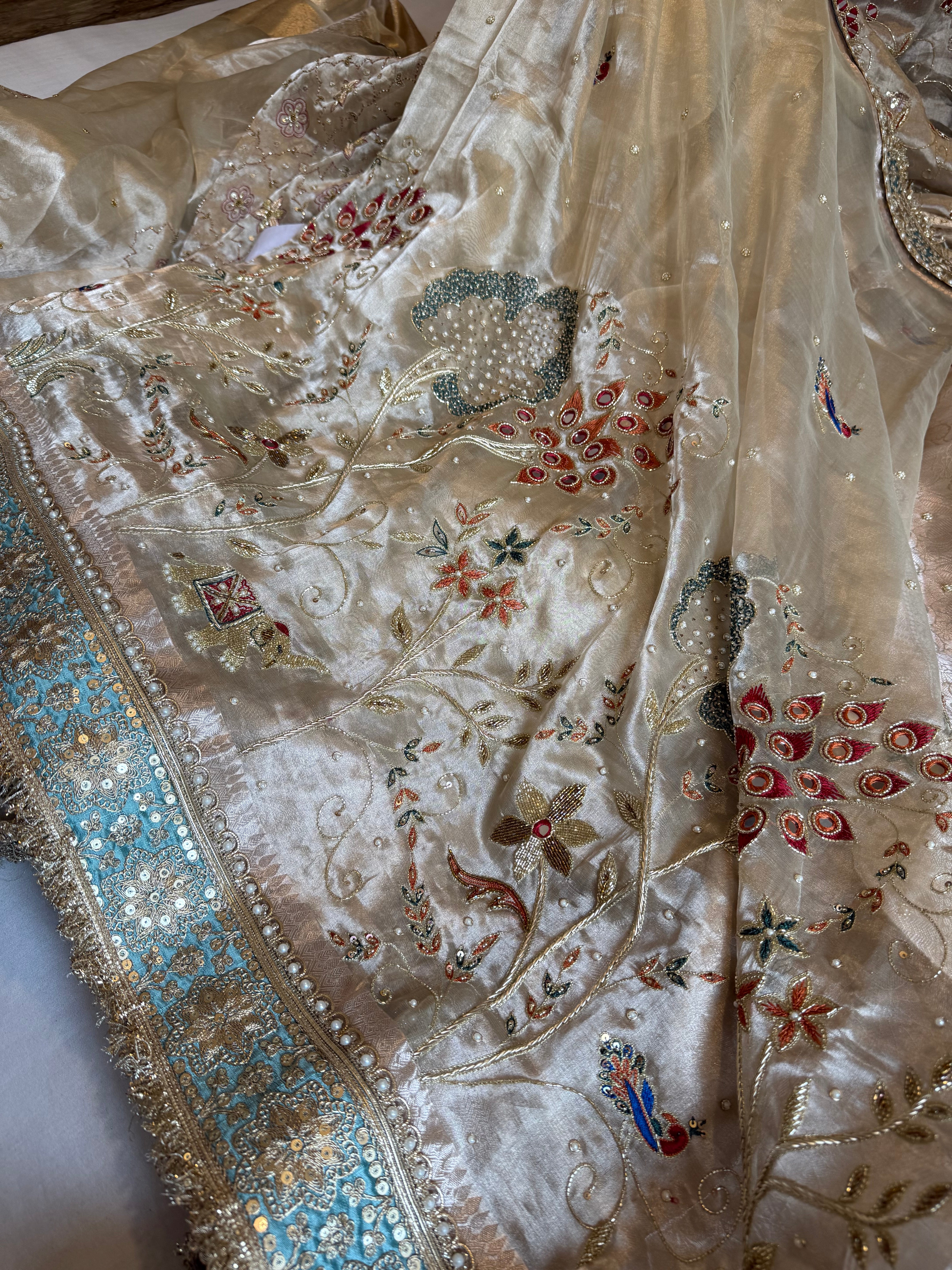 Kutchi inspired “sheesham edit” mirror work and meenakari hand embroidered saree