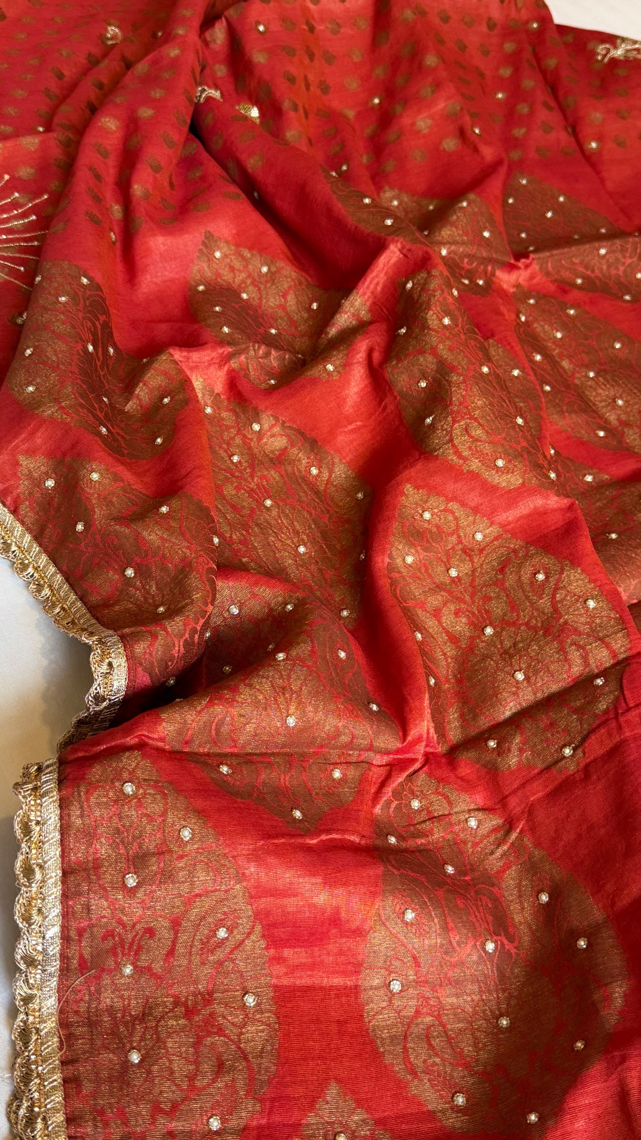 Chilly red tissue gorgette kadhwa antique zari hand embroidered saree