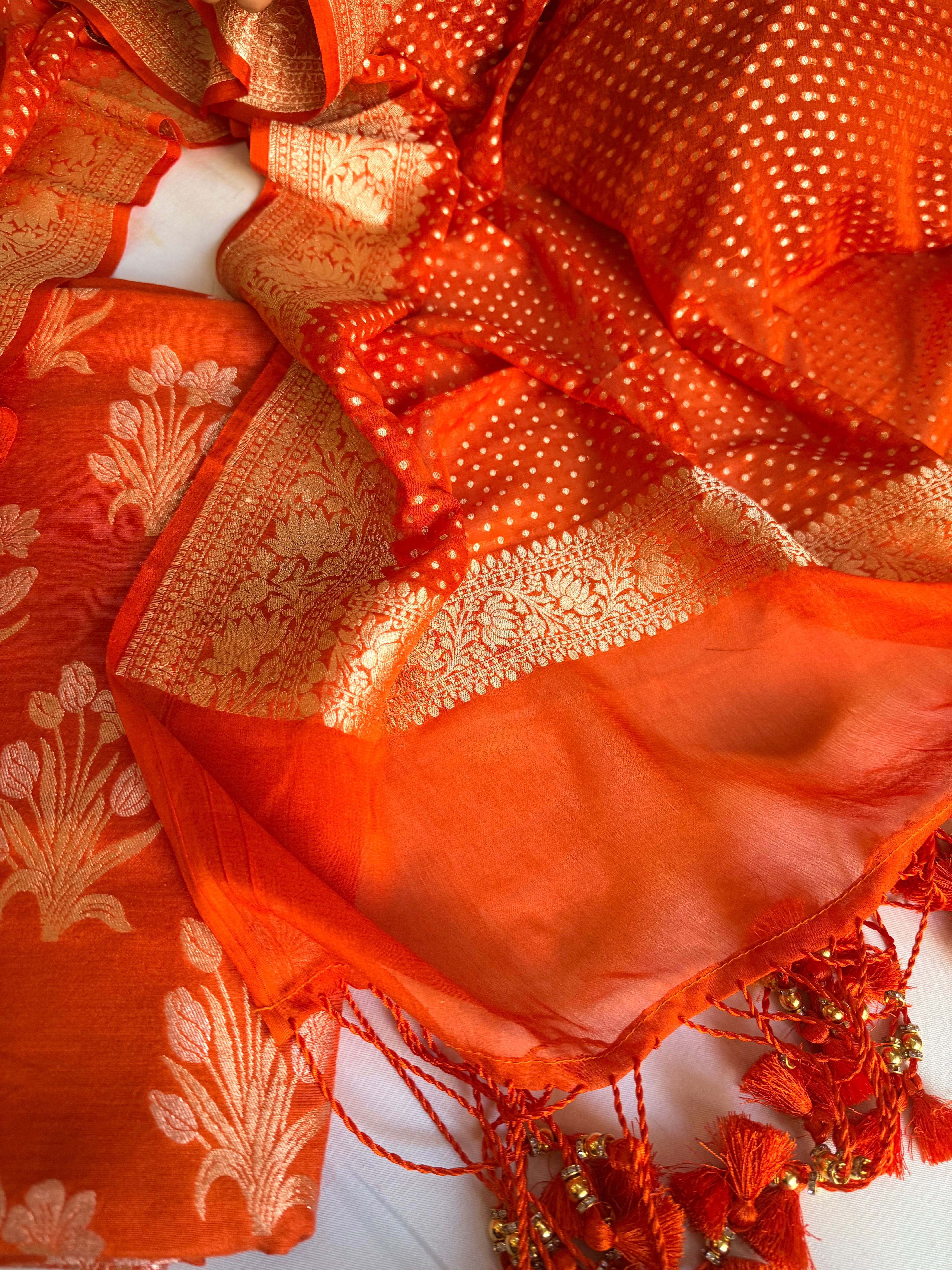 Moonga silk kadhwa kurta paired with gorgette duppata with latkans