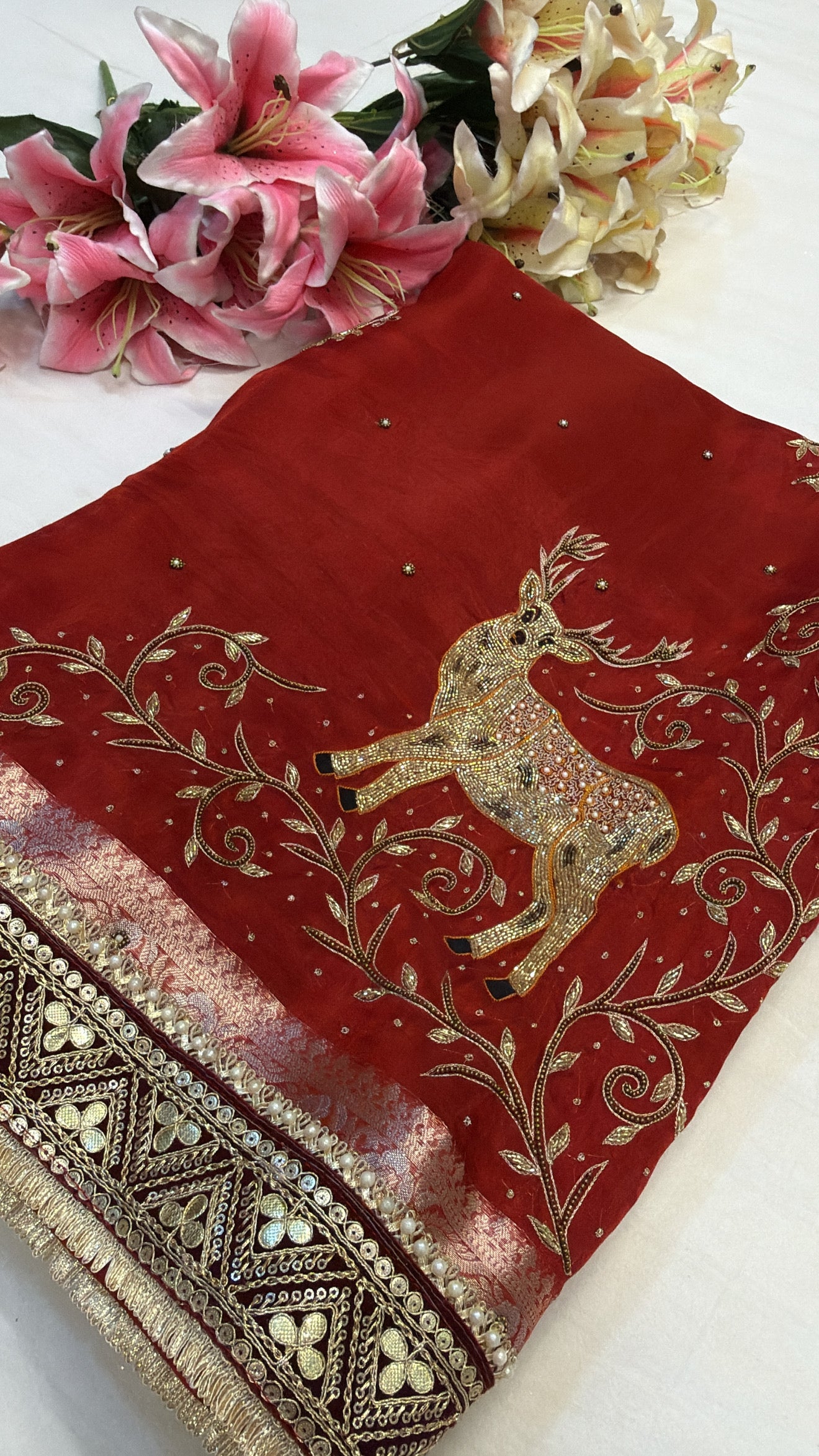 Blood red deer motif husn tissue silk hand embroidered kadhwa saree