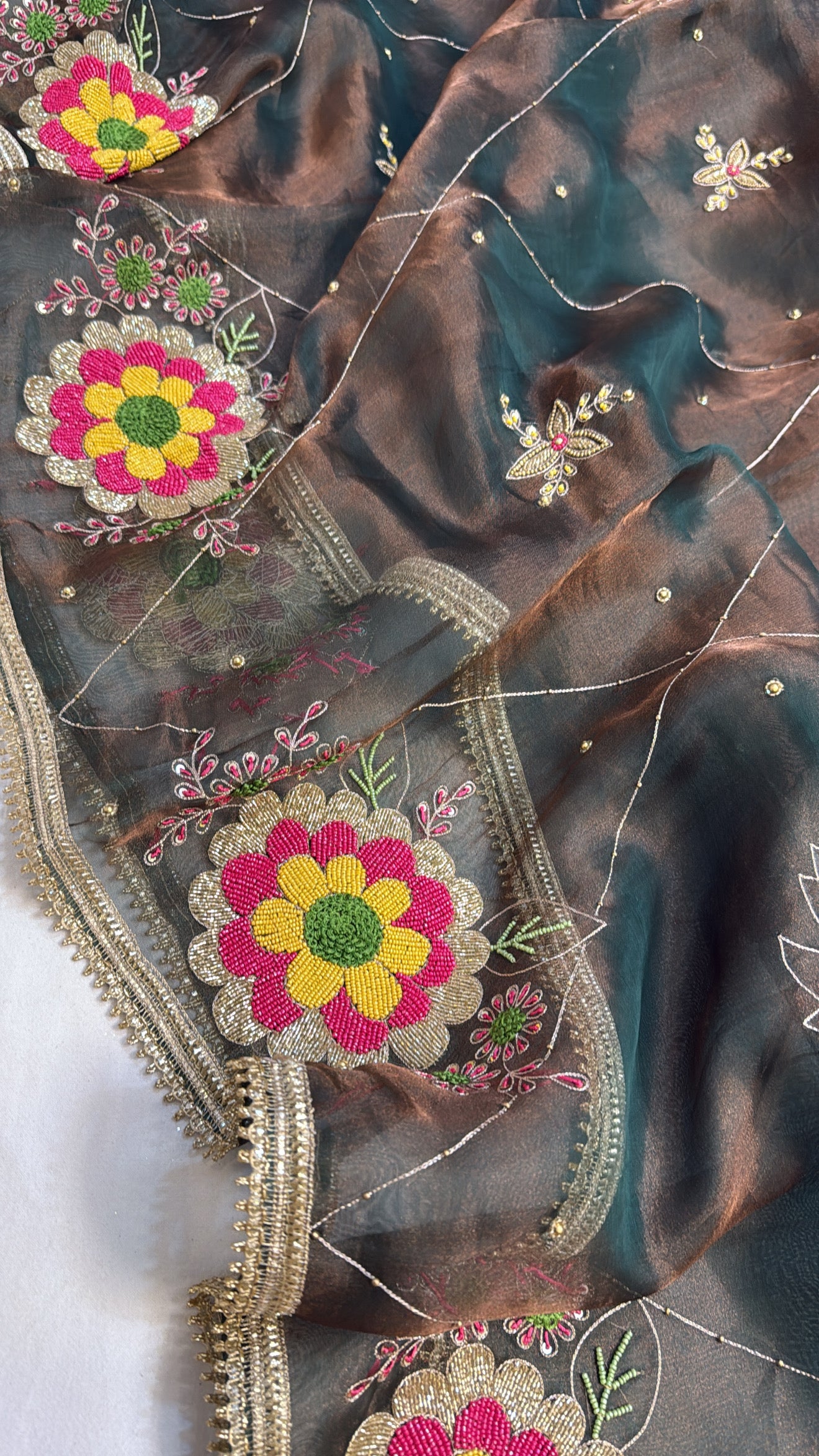 Copperish green tissue silk hand embroidered kadhwa gotapatti saree