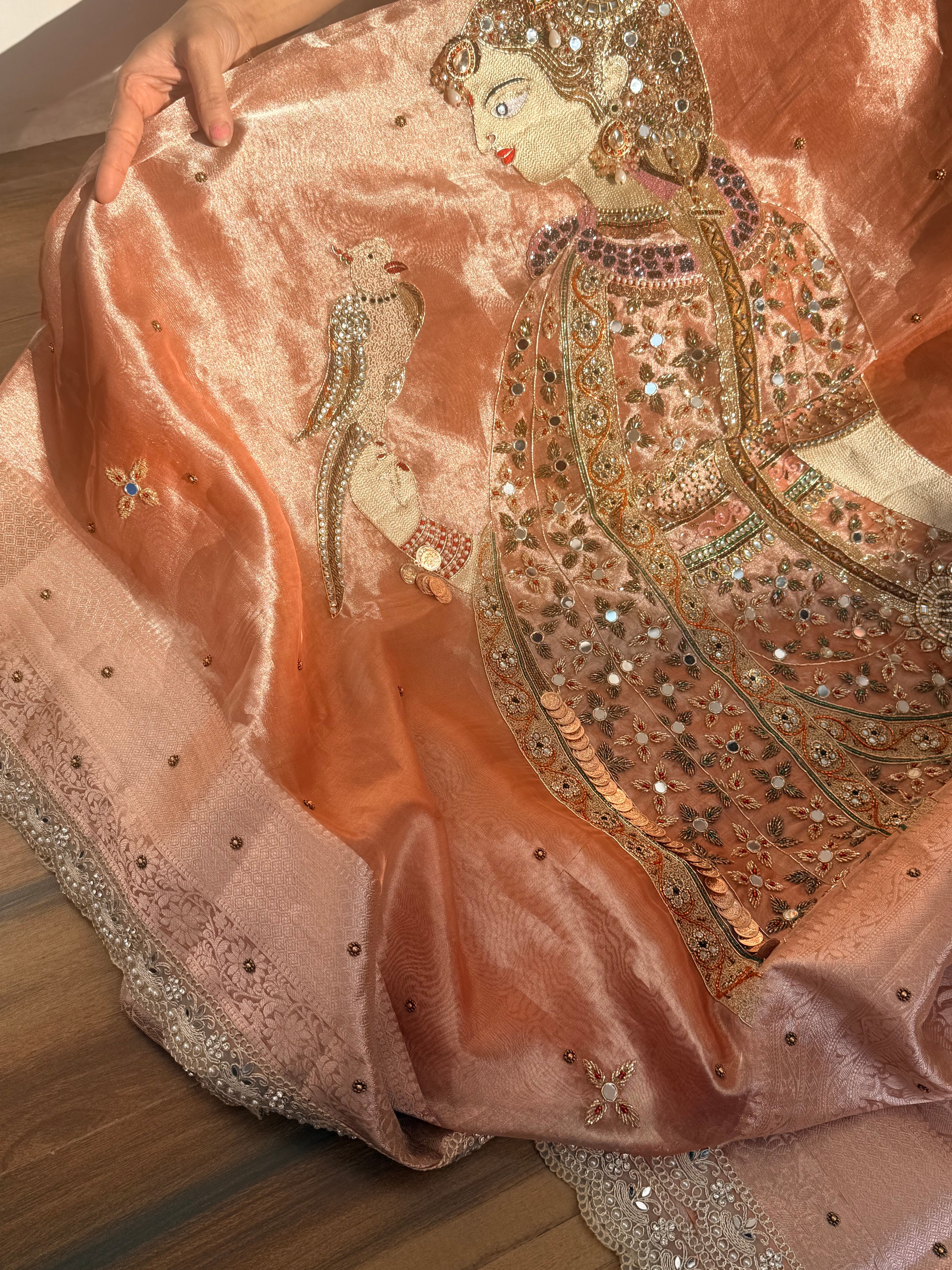 Heer saree with jadau necklace work hand embroidered tissue silk gajri peach saree