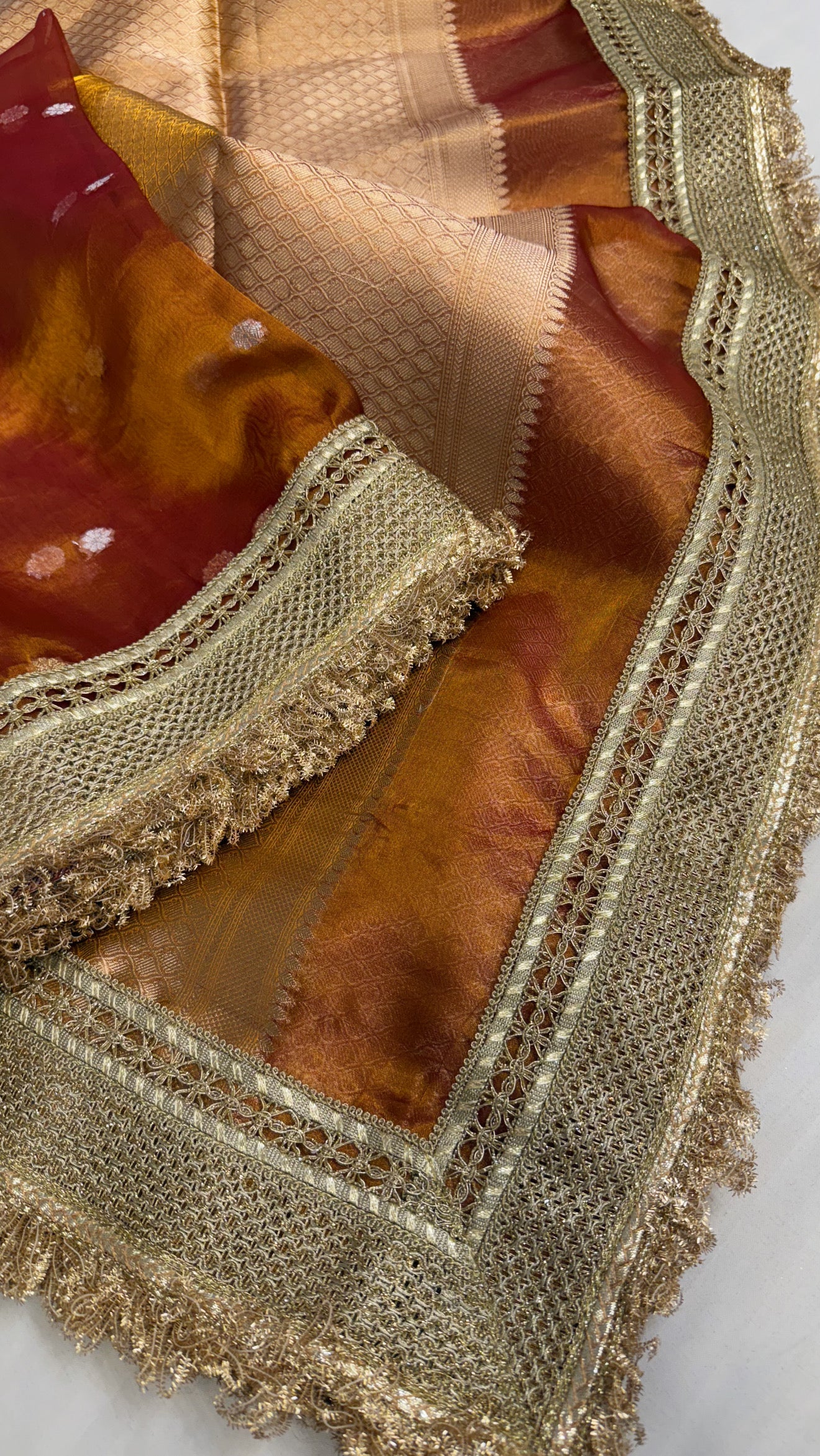 Maharani burnt orange tissue silk kadhwa buti saree