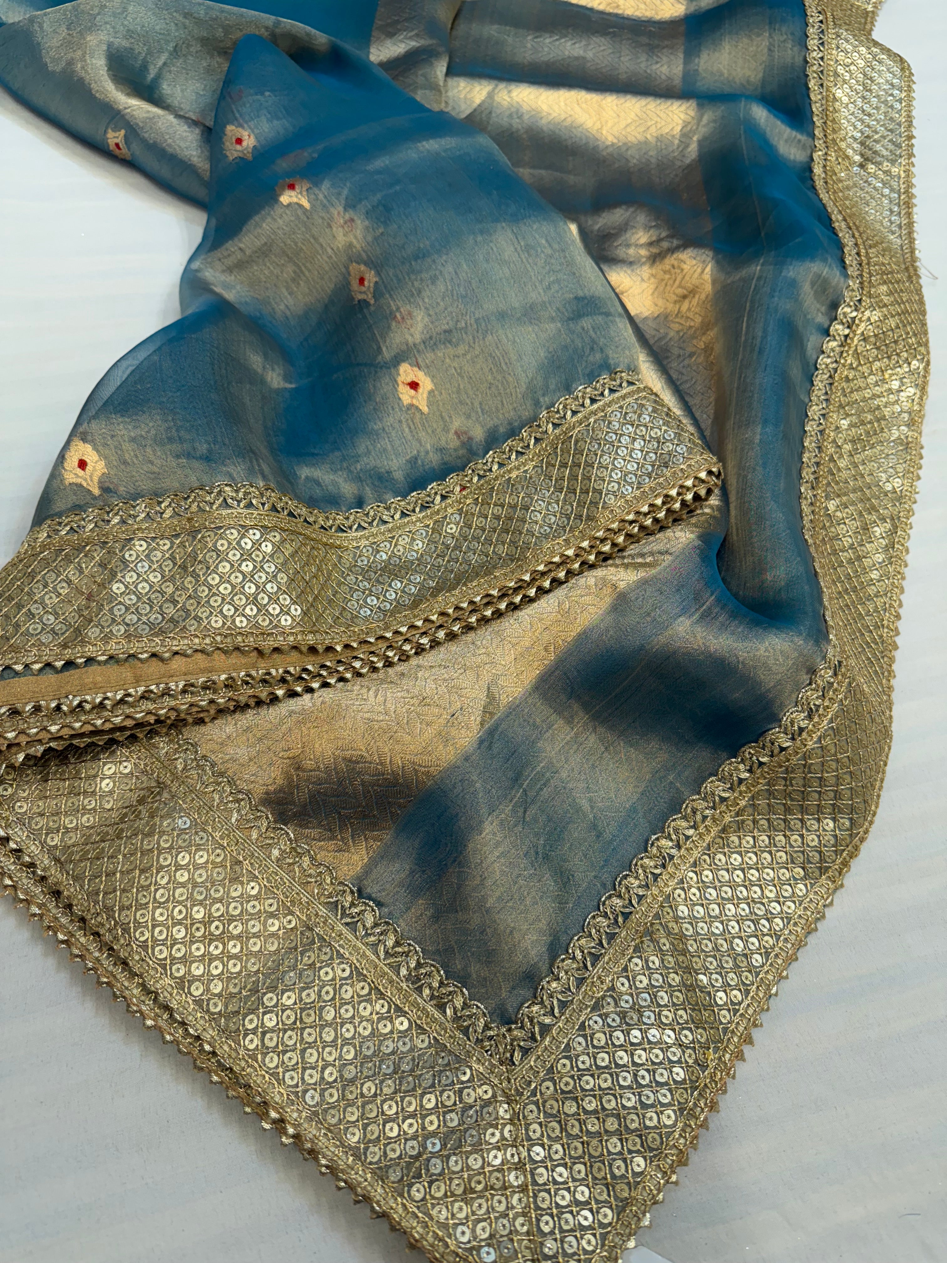 Aqua blue maharani tissue silk meenakari buti saree