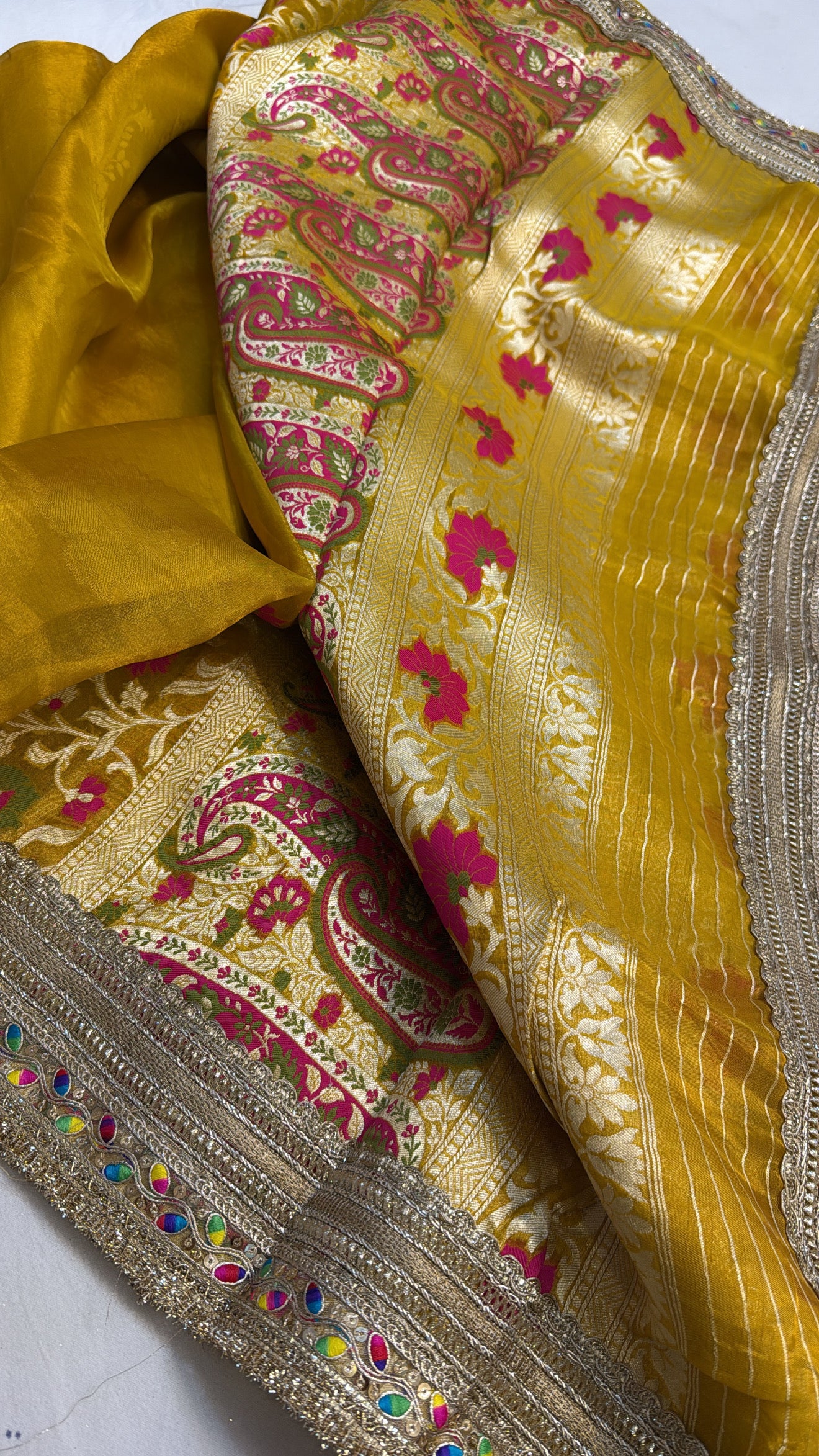 Maharani sunrise yellow tissue silk meenakari kadhwa gotapatti saree