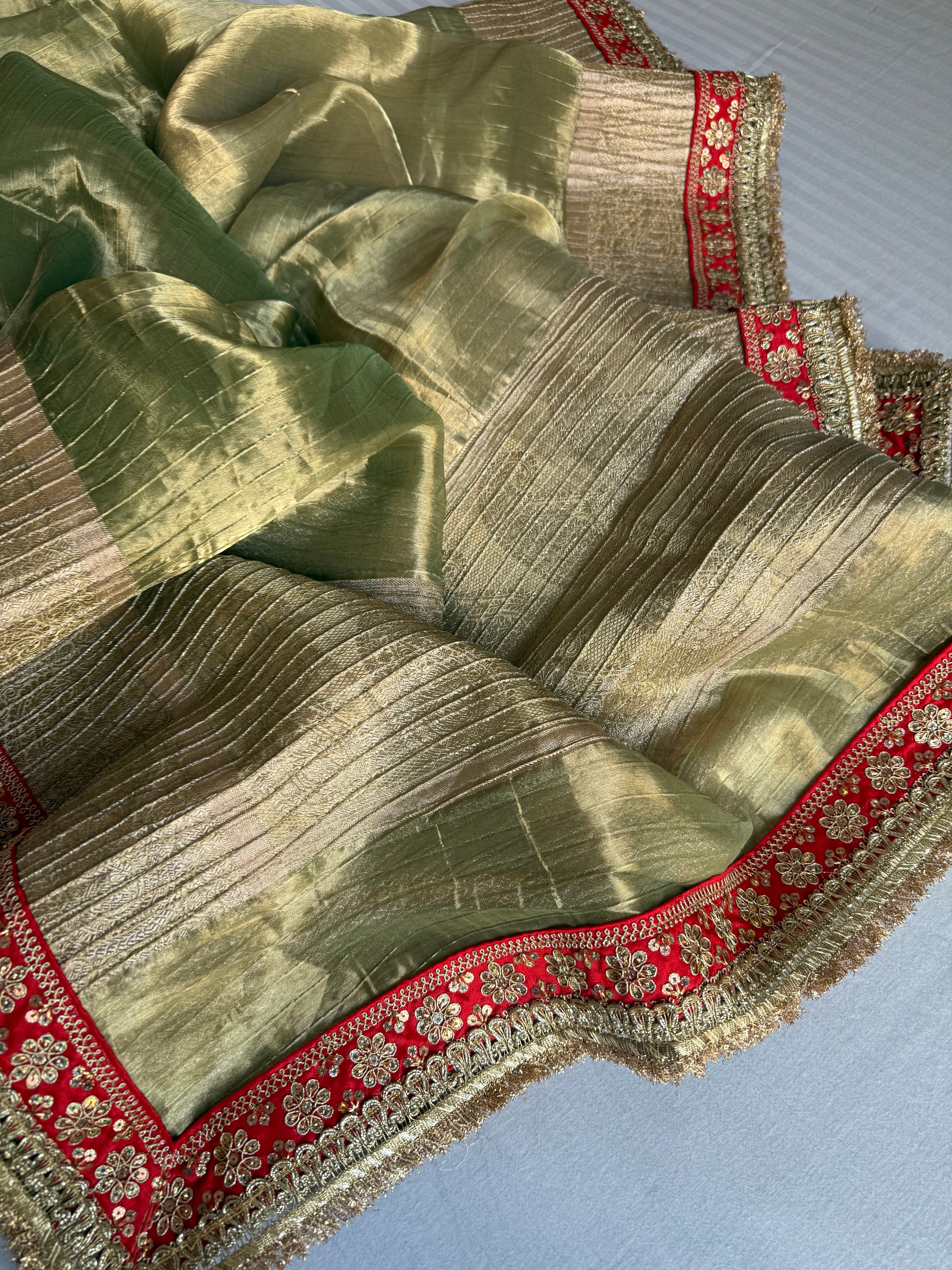 Mint green pleated maharani tissue silk kadhwa saree