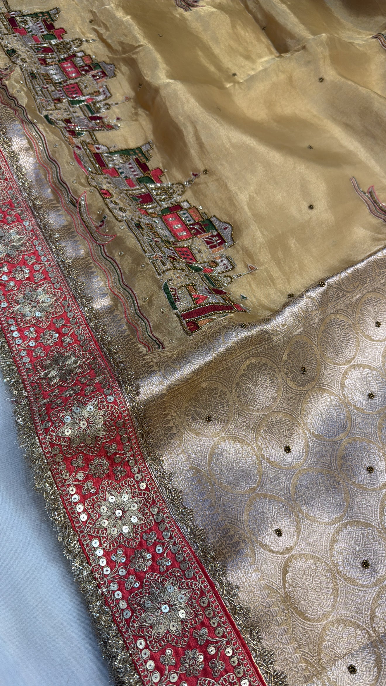 Soft golden banarasi ghat hand embroidered tissue silk kadhwa saree