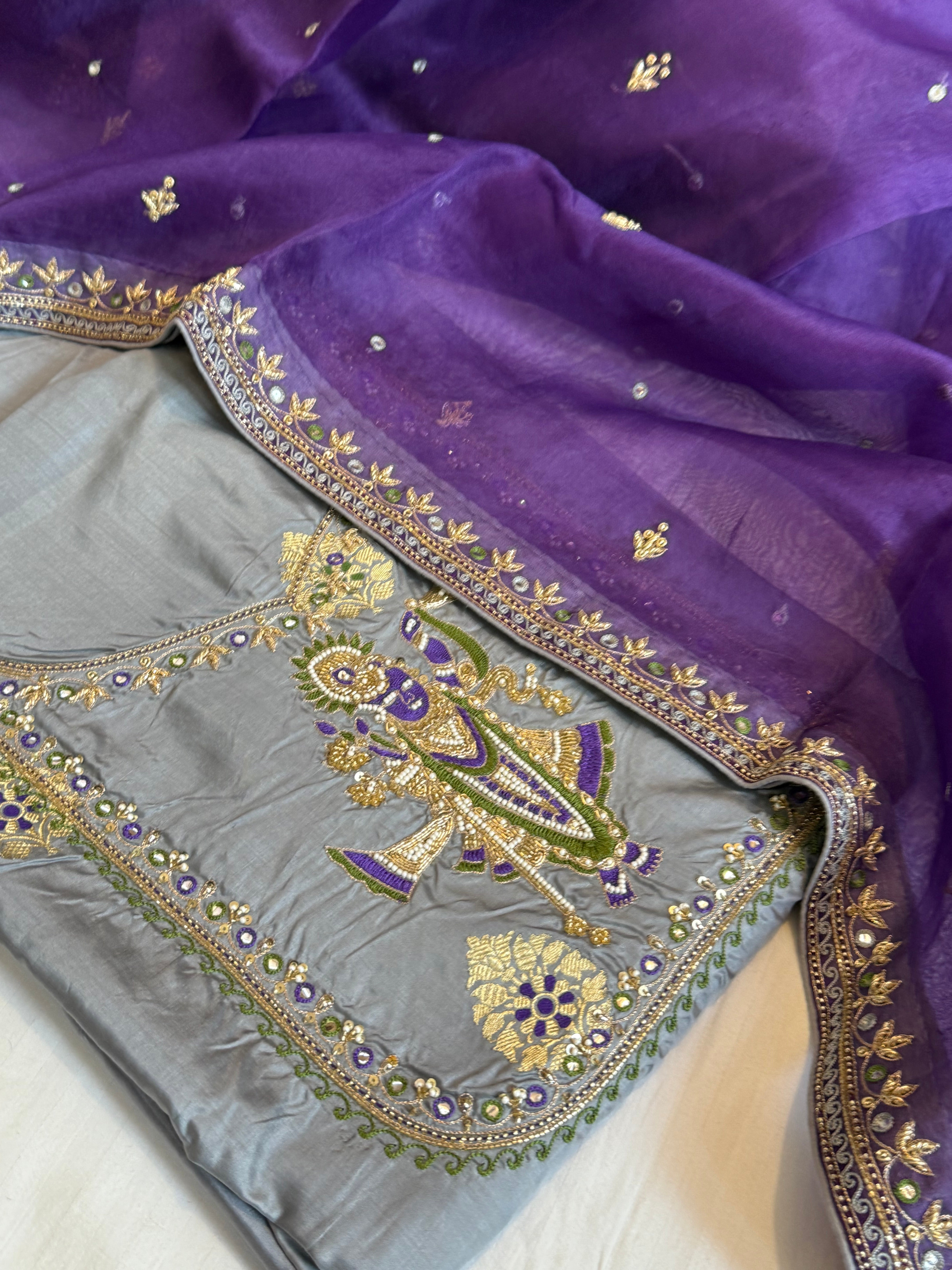 Lavender- grey shade katan silk “shrinathji” motif inspired katan silk hand embroidered suit set