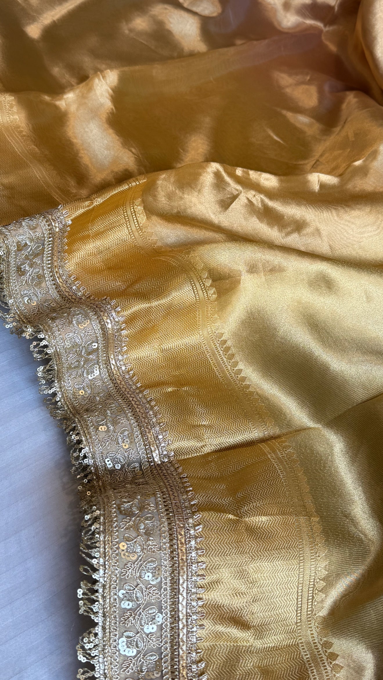 Earthy shades of rang birangi maharani tissue silk kadhwa saree