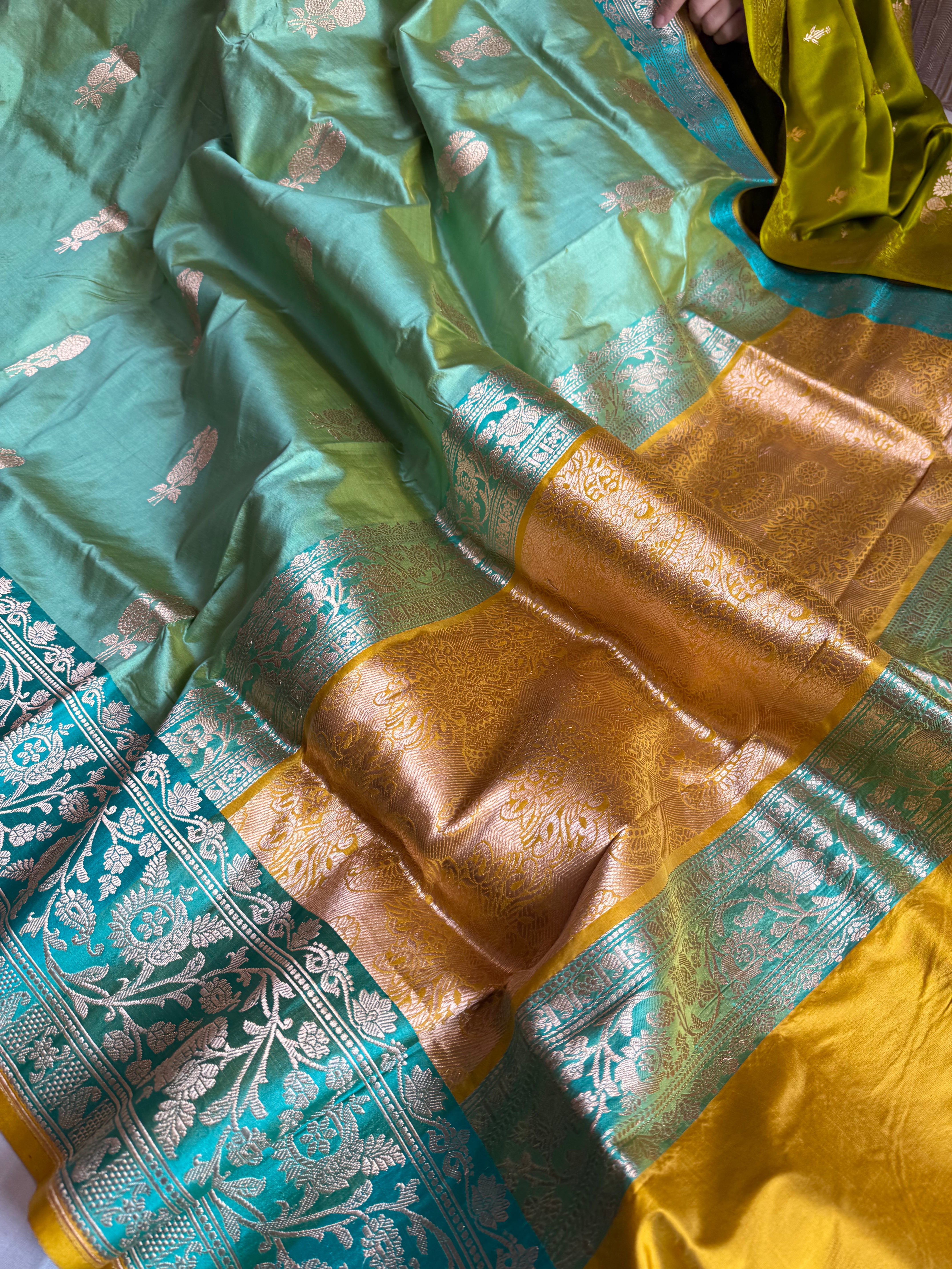 Firozi blue-olive gold contrast combination katan silk kadhwa saree