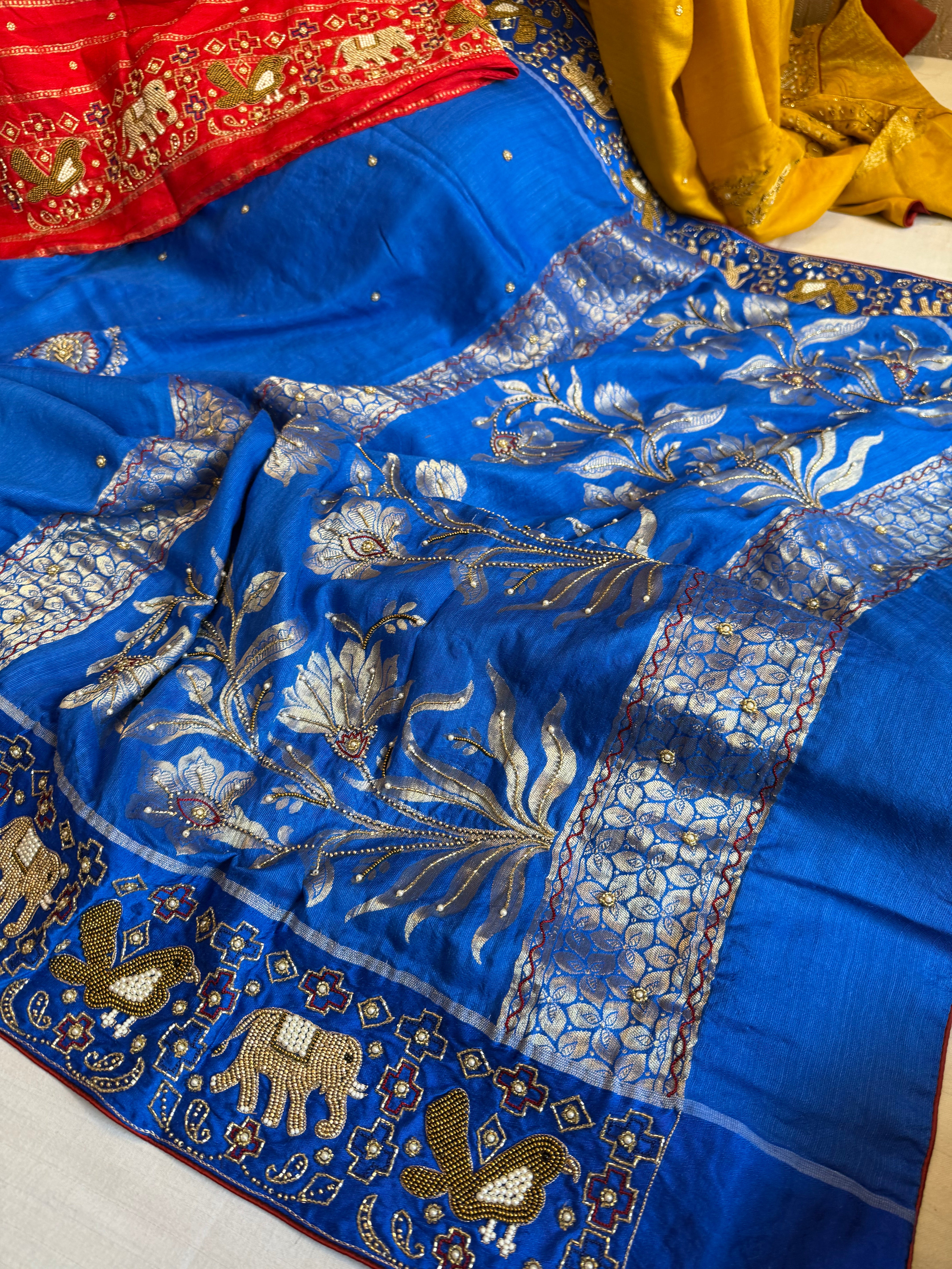 Moonga silk inspired ikkat patola inspired hand embroidered kadhwa saree