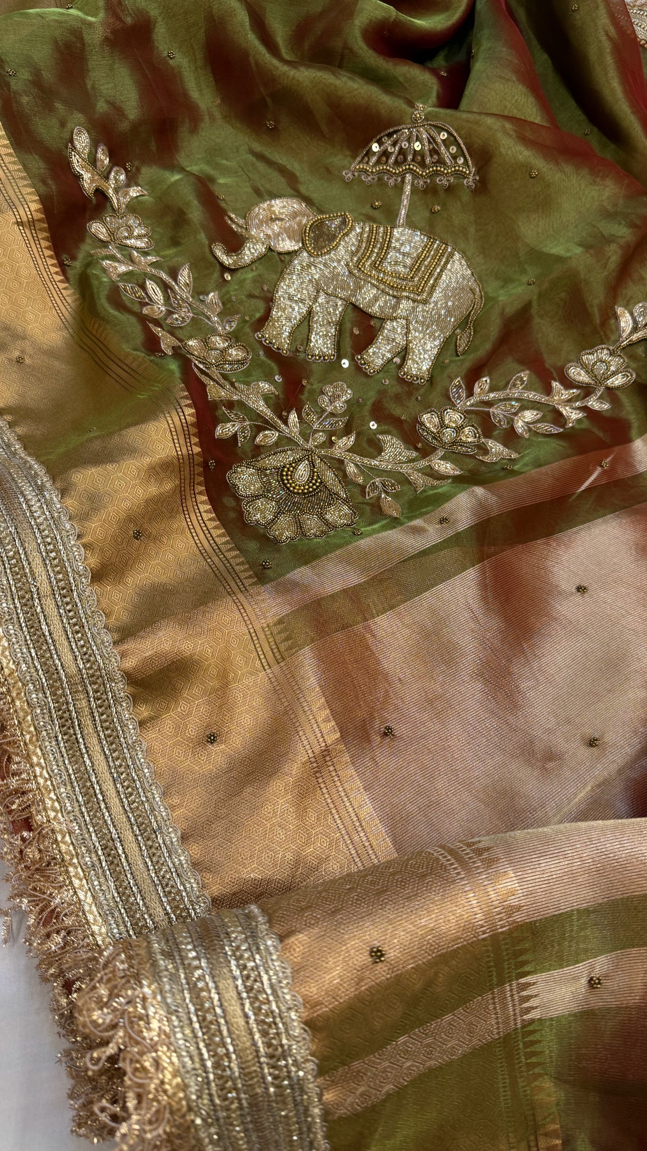 Dulhan ki maa wali sarees - Mehendi green elephant motif hand embroidered tissue saree