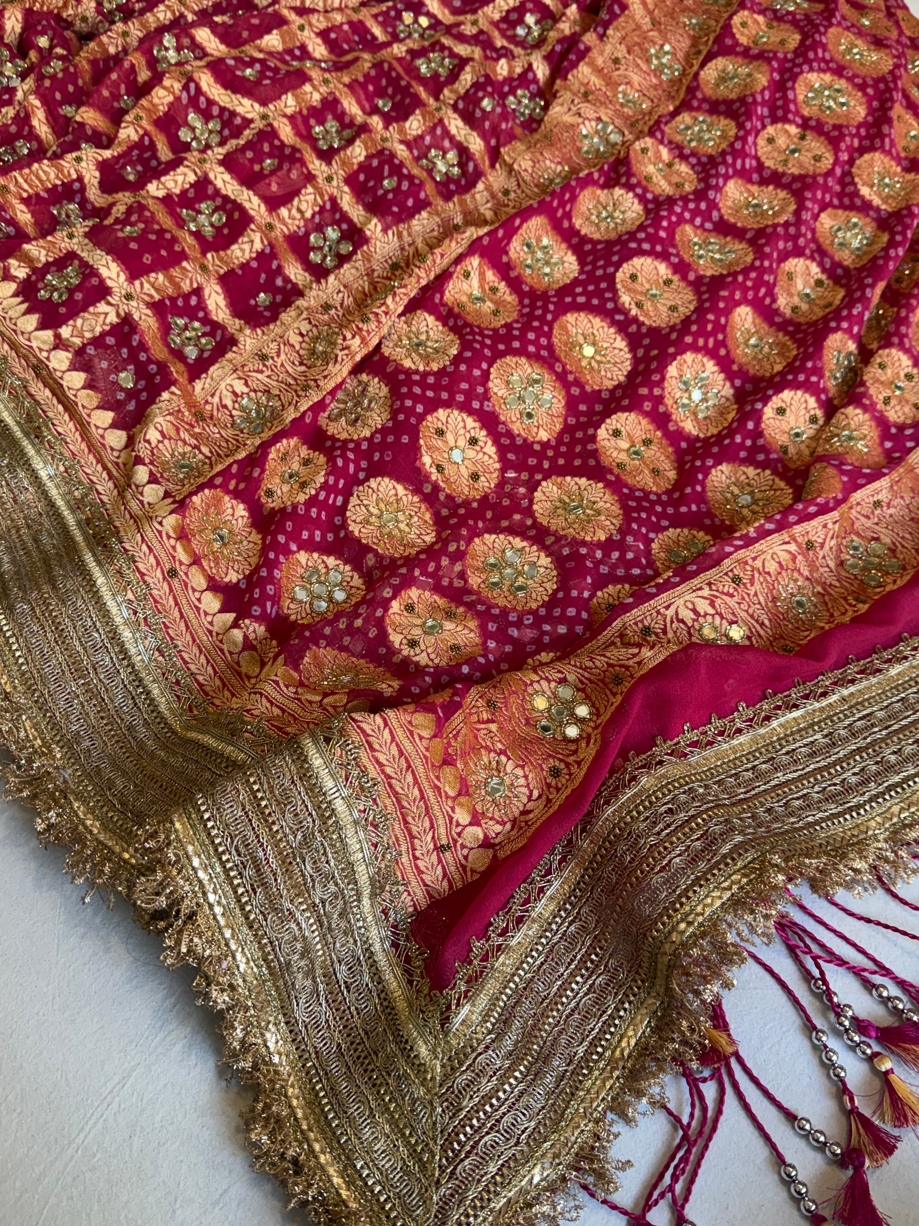 Cherry pink rai bandhej mirror work banarasi gorgette saree with long latkans