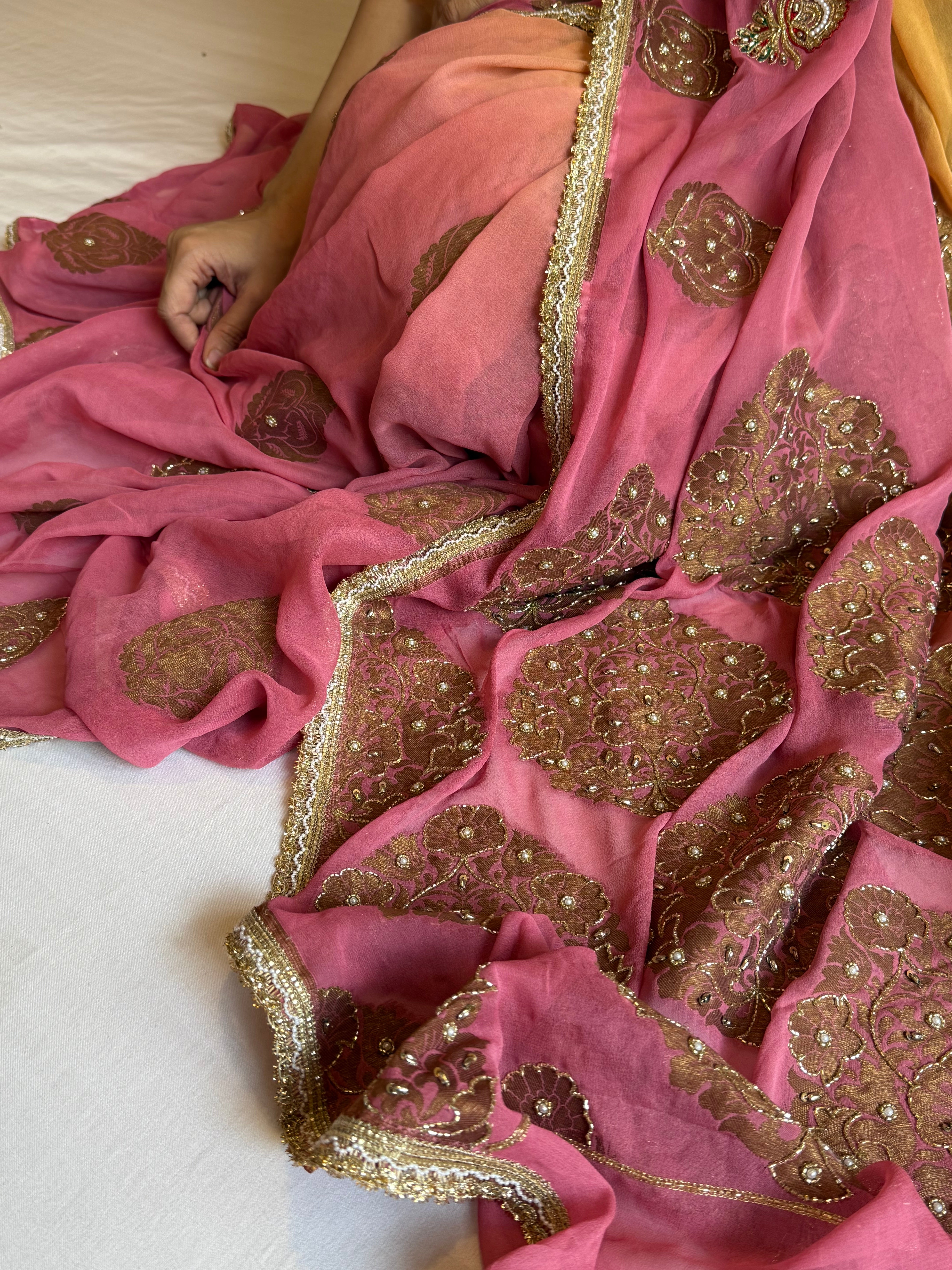 Haldi yellow and pink gorgette banarasi hand embroidered antique zari kadhwa saree