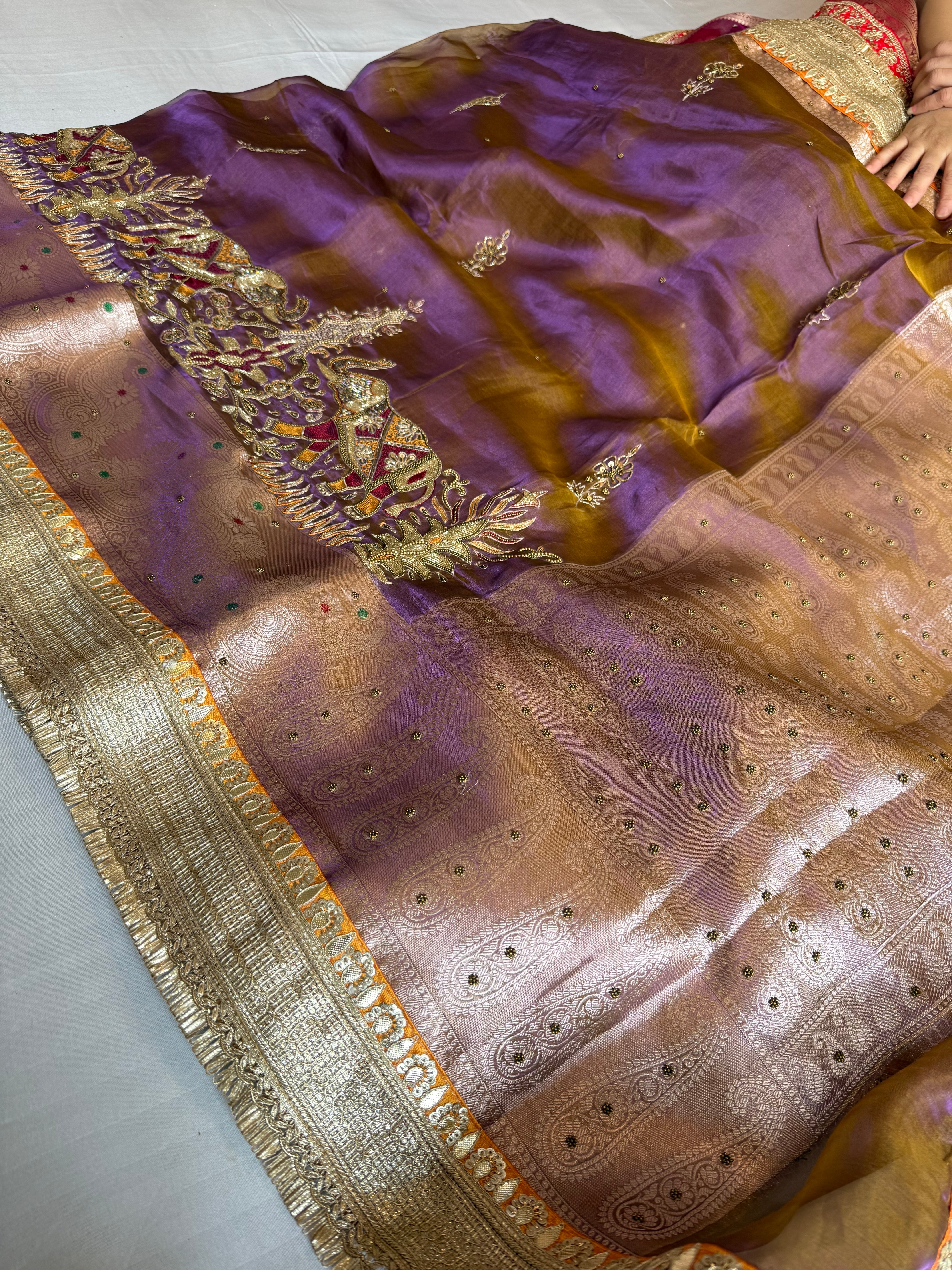 Elephant motif lavender tissue silk hand embroidered kadhwa saree