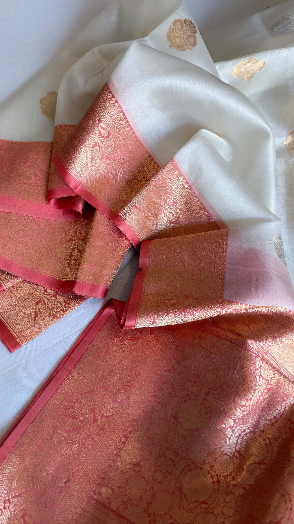 White-peach kora silk banarasi border kadhwa saree
