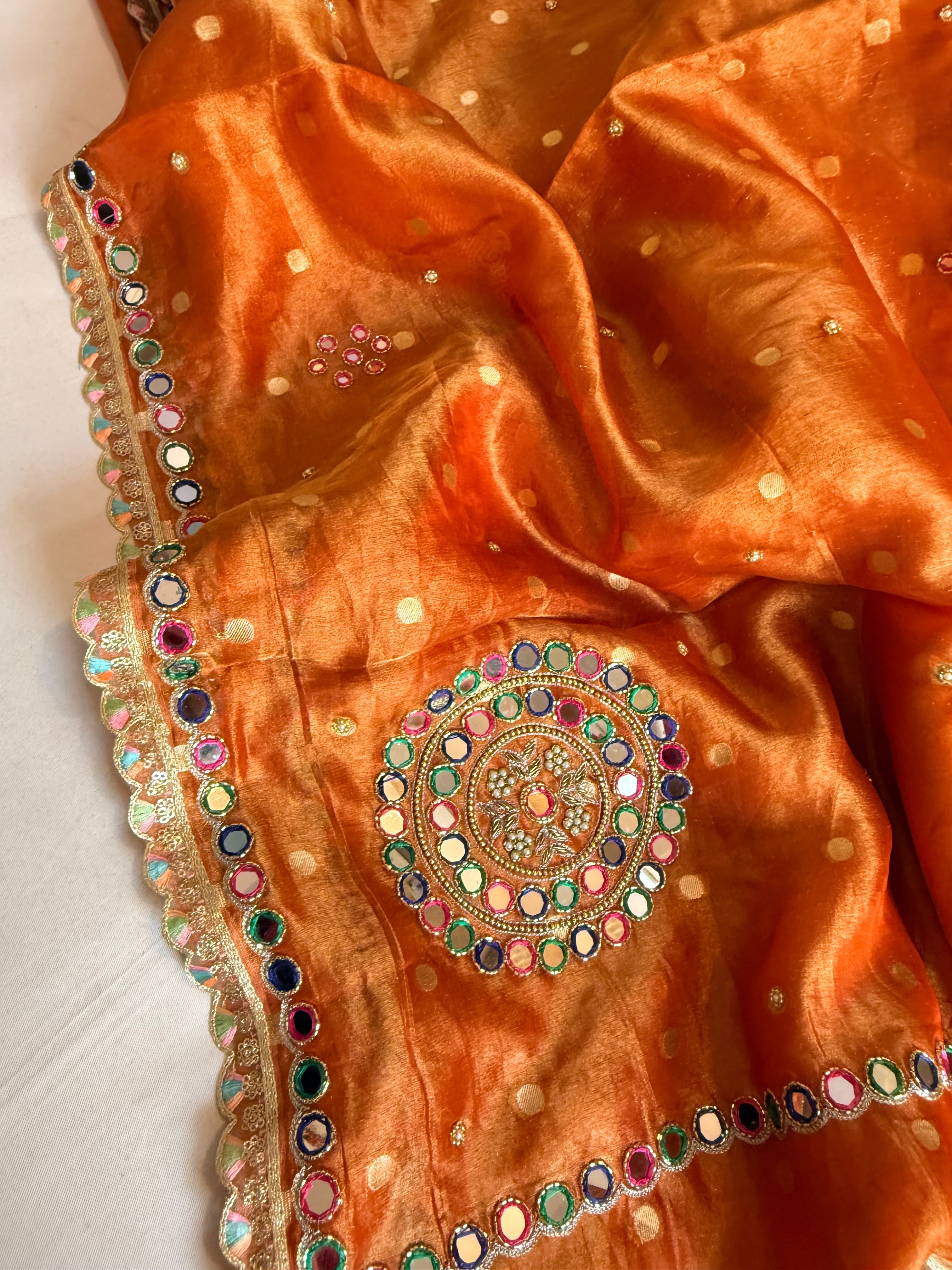 Fanta orange tissue silk meenakari mirror work hand embroidered saree