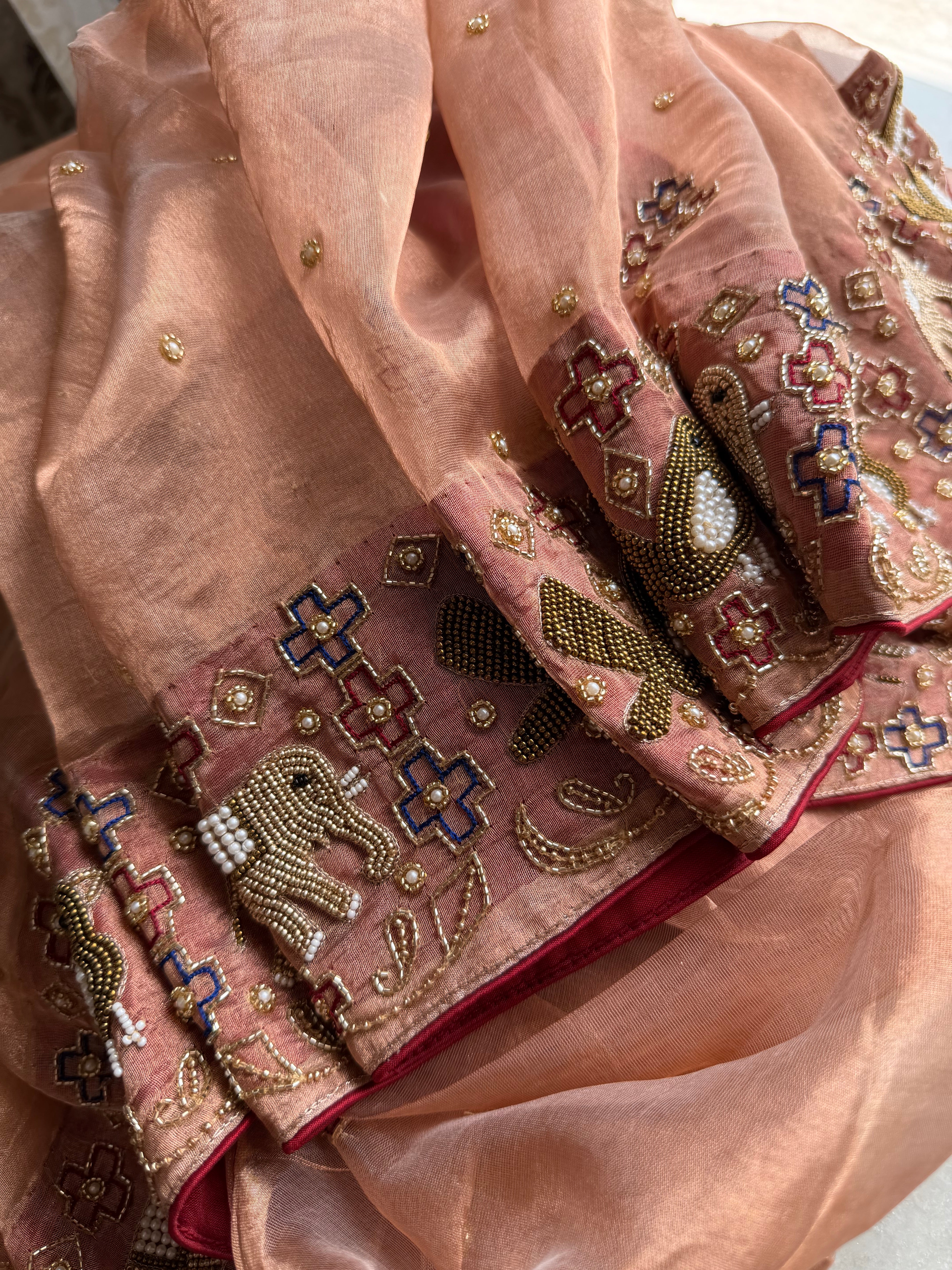 Hathi & chiriya wali border copper tissue silk hand embroidered saree