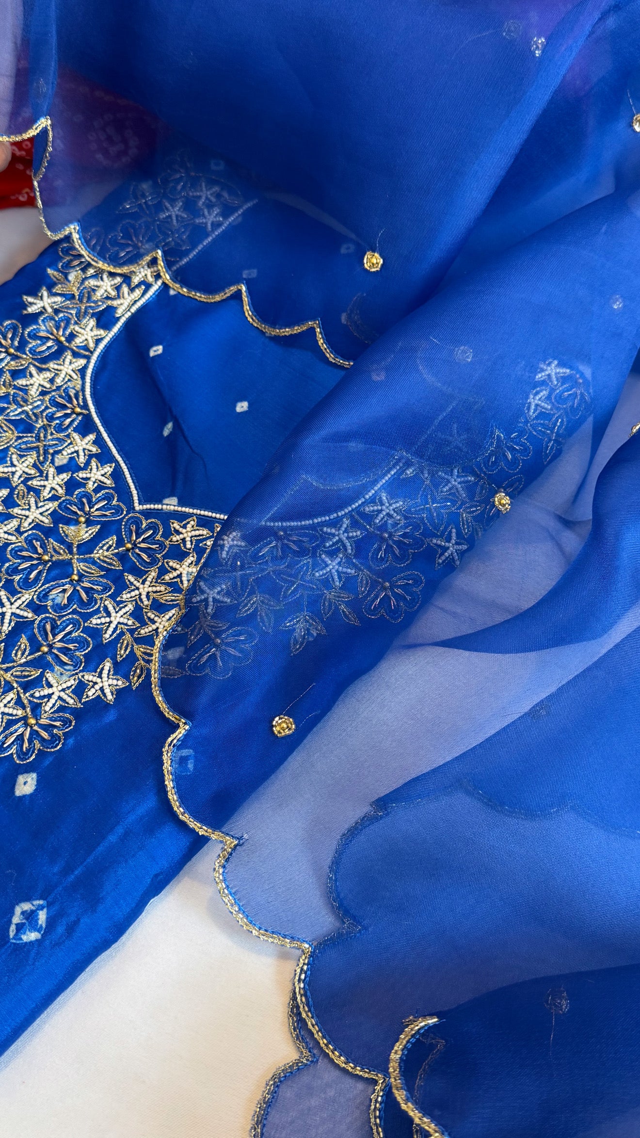 Electric blue raw mango bandhej hand embroidered kadhwa suit set