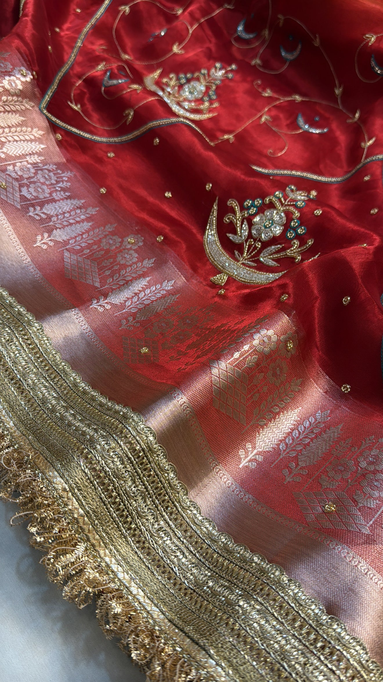 Dulhan ka joda husn red tissue silk hand embroidered saree