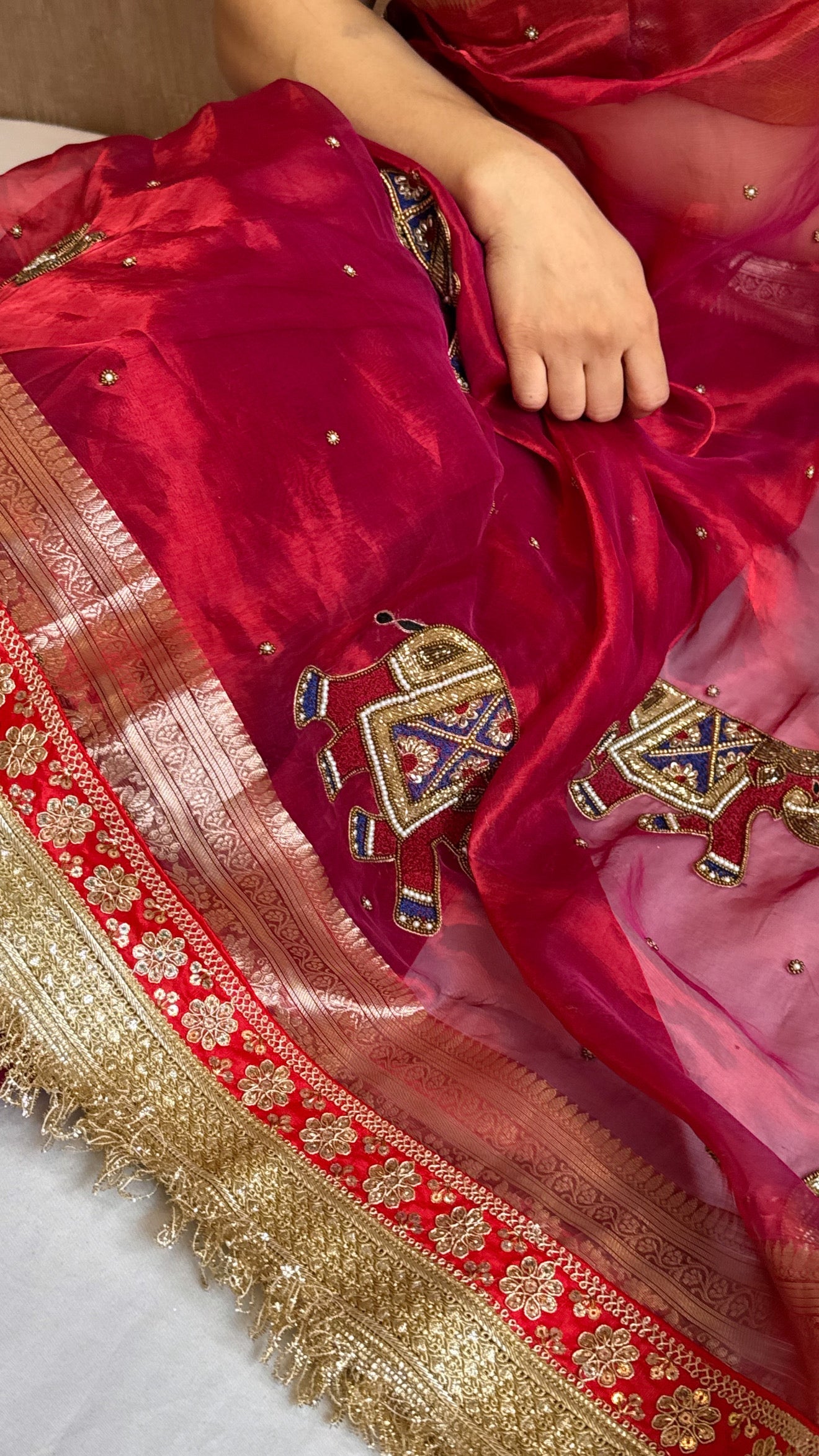 Elephant motif cranberry metallic red husn tissue silk hand embroidered saree