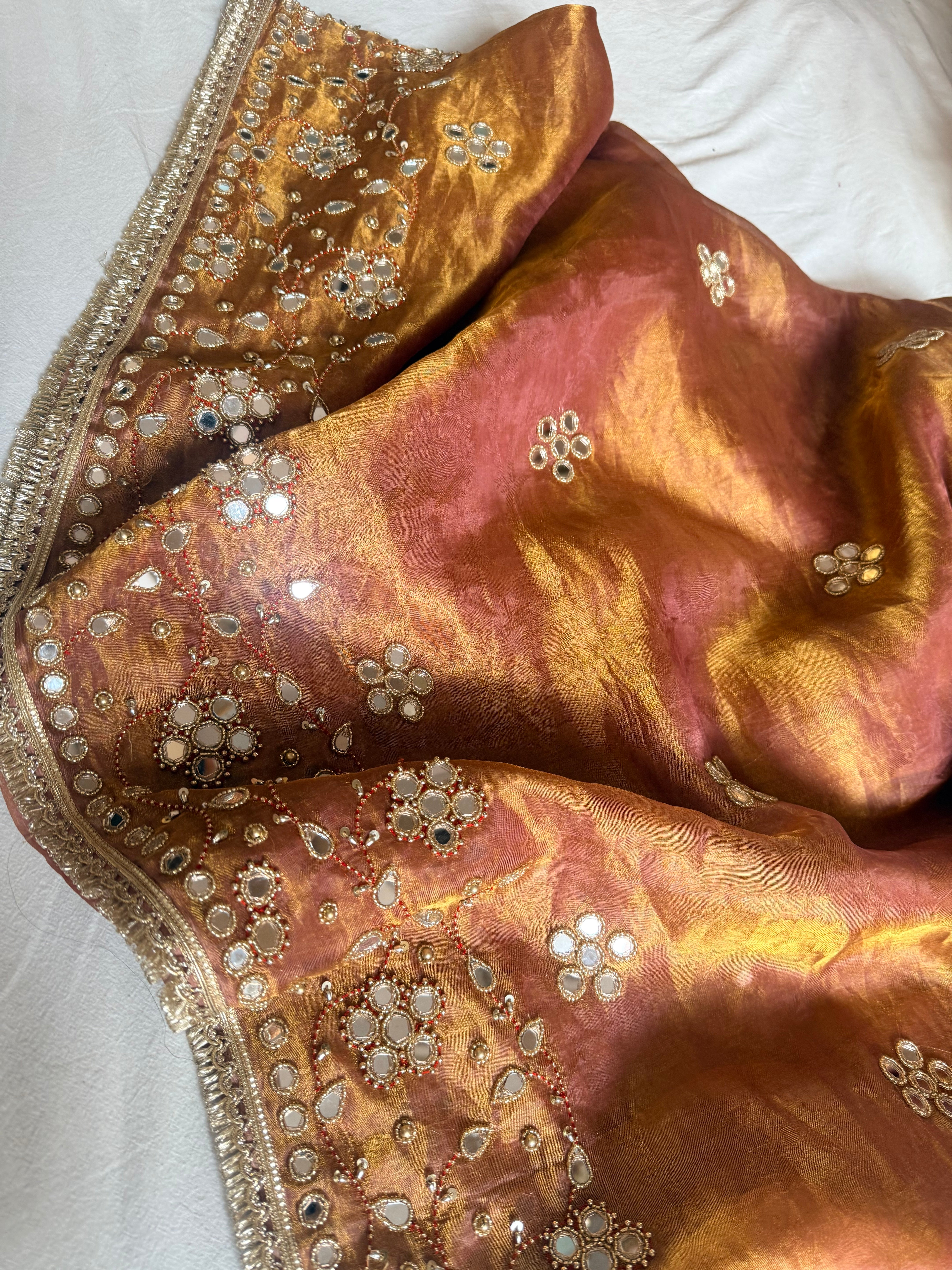 Molten pink tissue silk mirrorwork hand embroidered saree