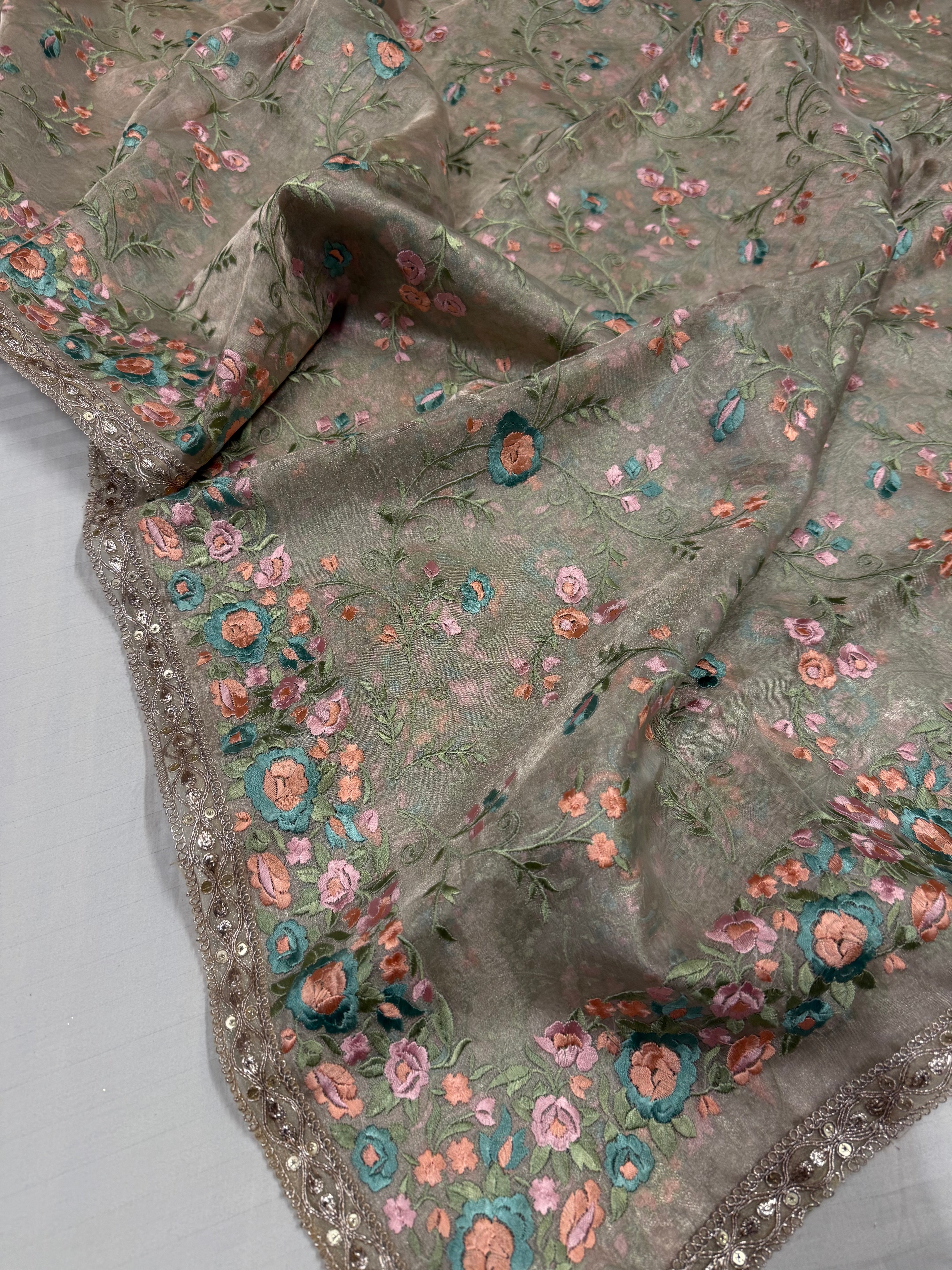 “Parsi gara” inspired tissue silk heavy resham work hand embroidered saree