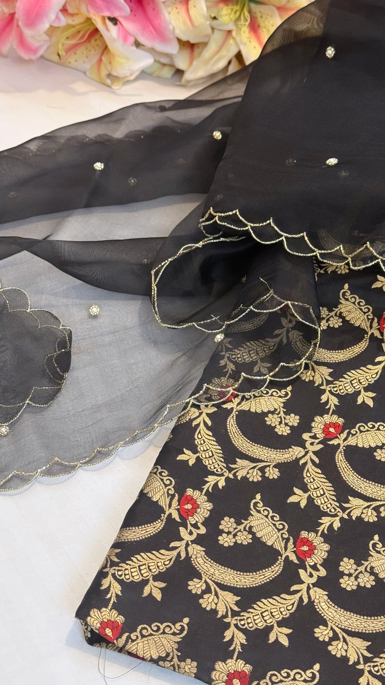 Black katan silk jungla meenakari kurta paired with scalloped kora silk duppata set