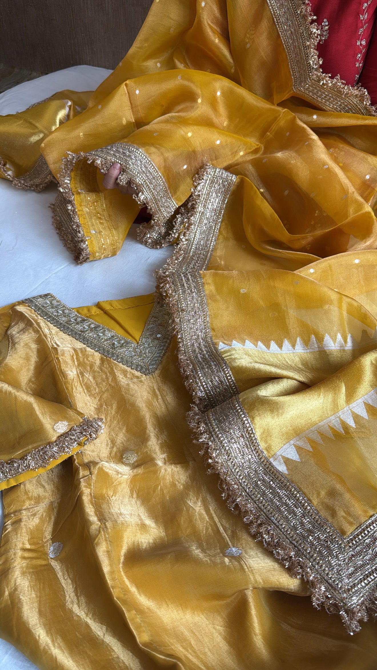 Haldi yellow tissue silk hand embroidered heeramandi semi stitched suit set