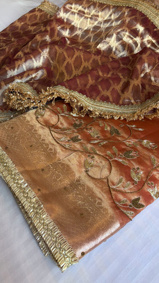 Husn tissue silk saree                     Maharani tissue silk is optional to add (Tick the box below and add to cart to add maharani duppata)