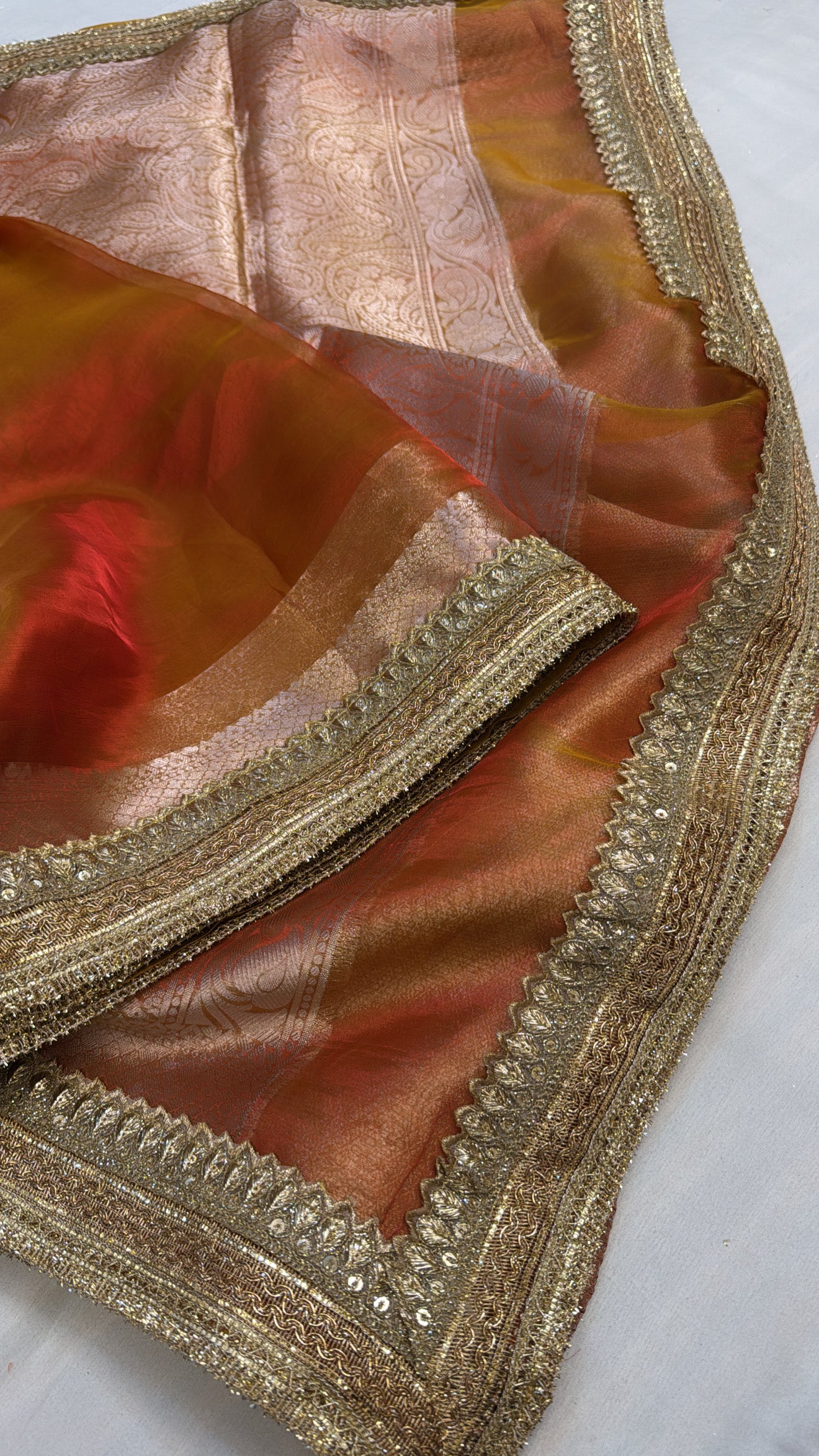 Maharani sunset orange tissue silk saree