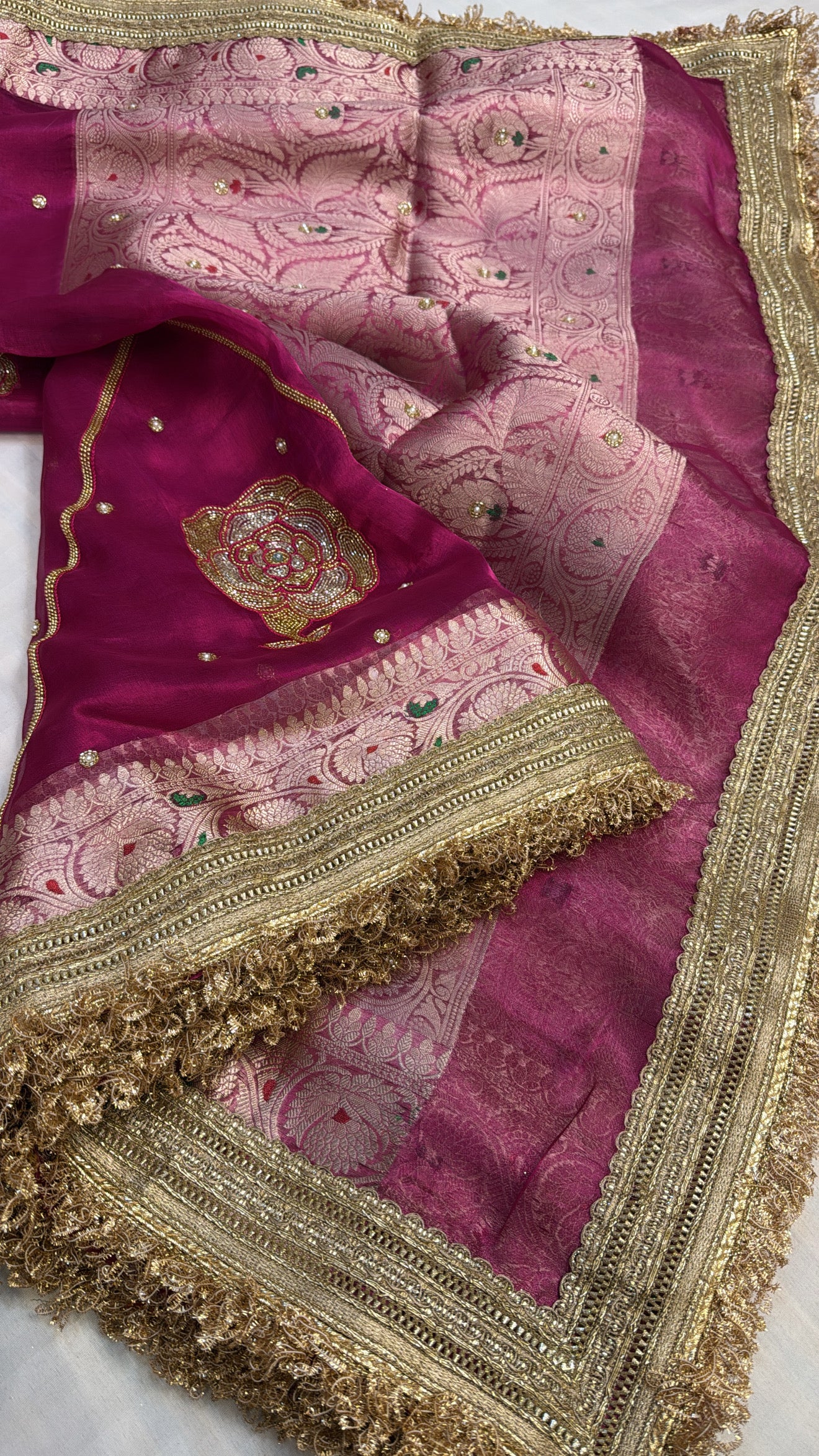 Cranberry pink tissue silk heavy hand embroidered kadhwa saree