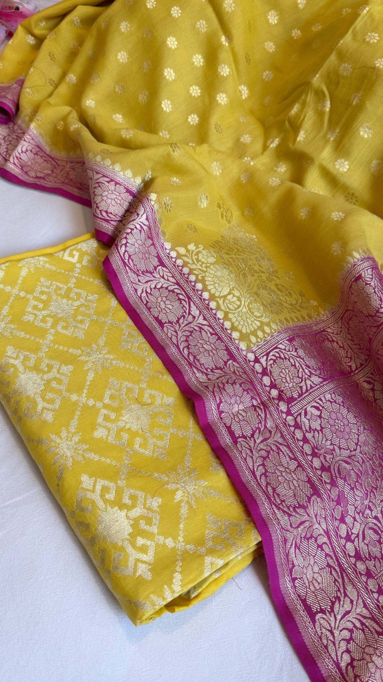 Banarasi haldi yellow - Rani pink chiniya silk kurta paired with moonga silk duppata set