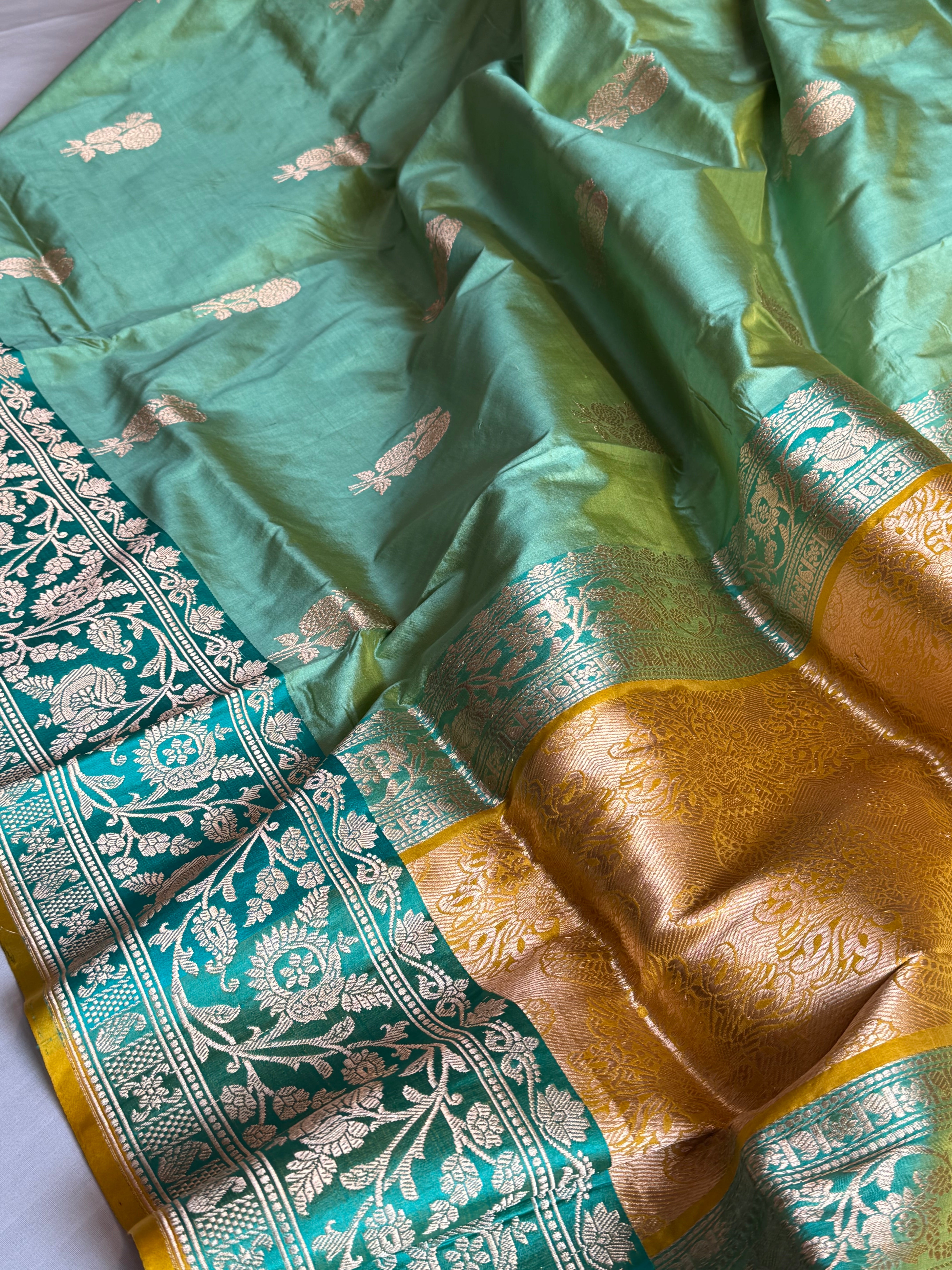 Firozi blue-olive gold contrast combination katan silk kadhwa saree