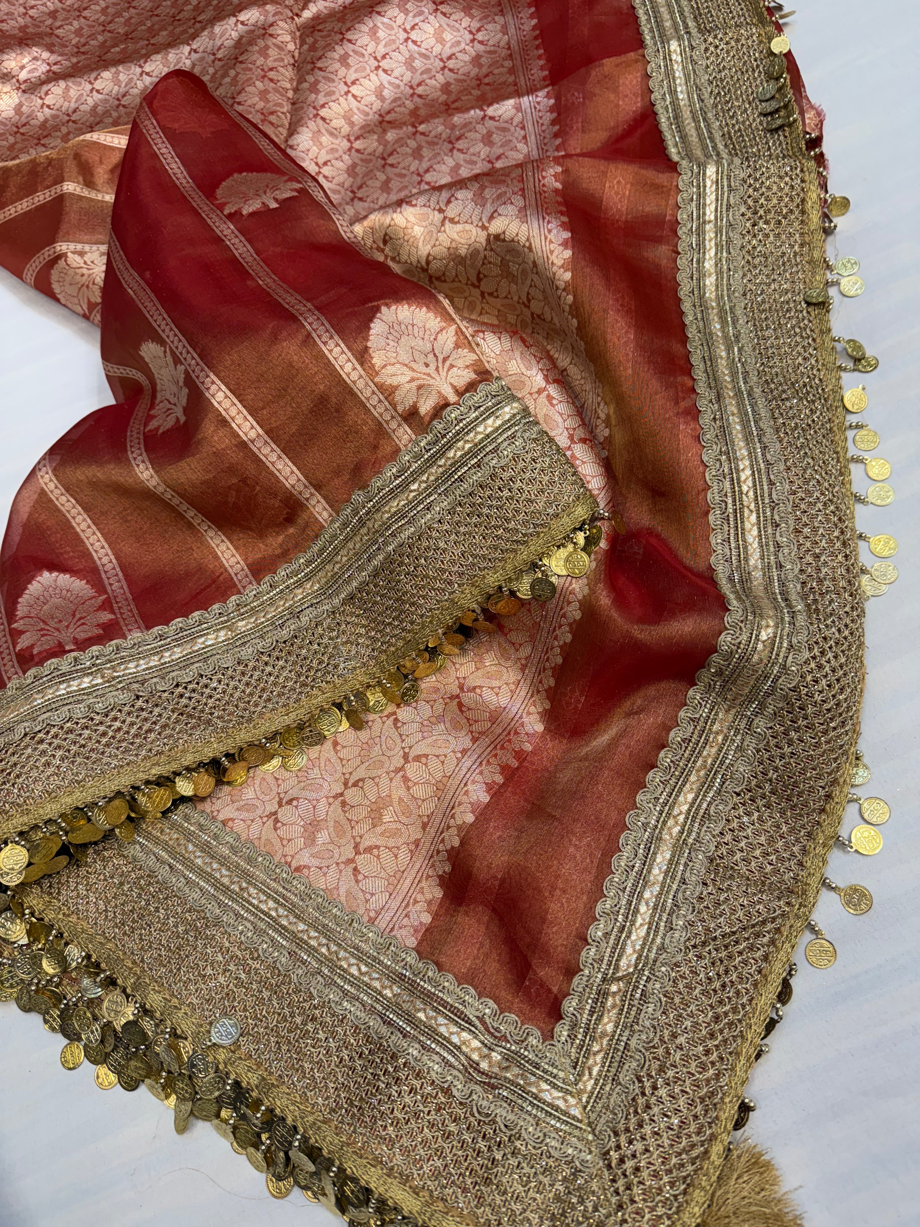 Maroonish red maharani tissue silk kadhwa saree
