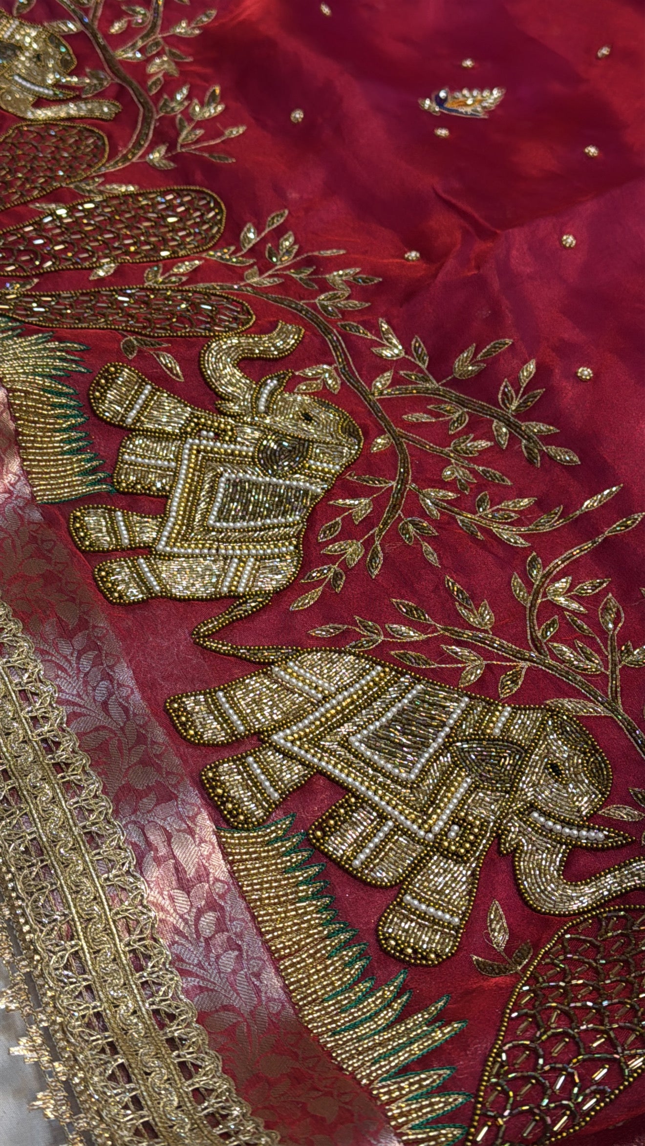 Dulhan ka joda husn red tissue silk hand embroidered saree