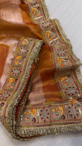 Fanta orange maharani tissue silk meenakari border saree