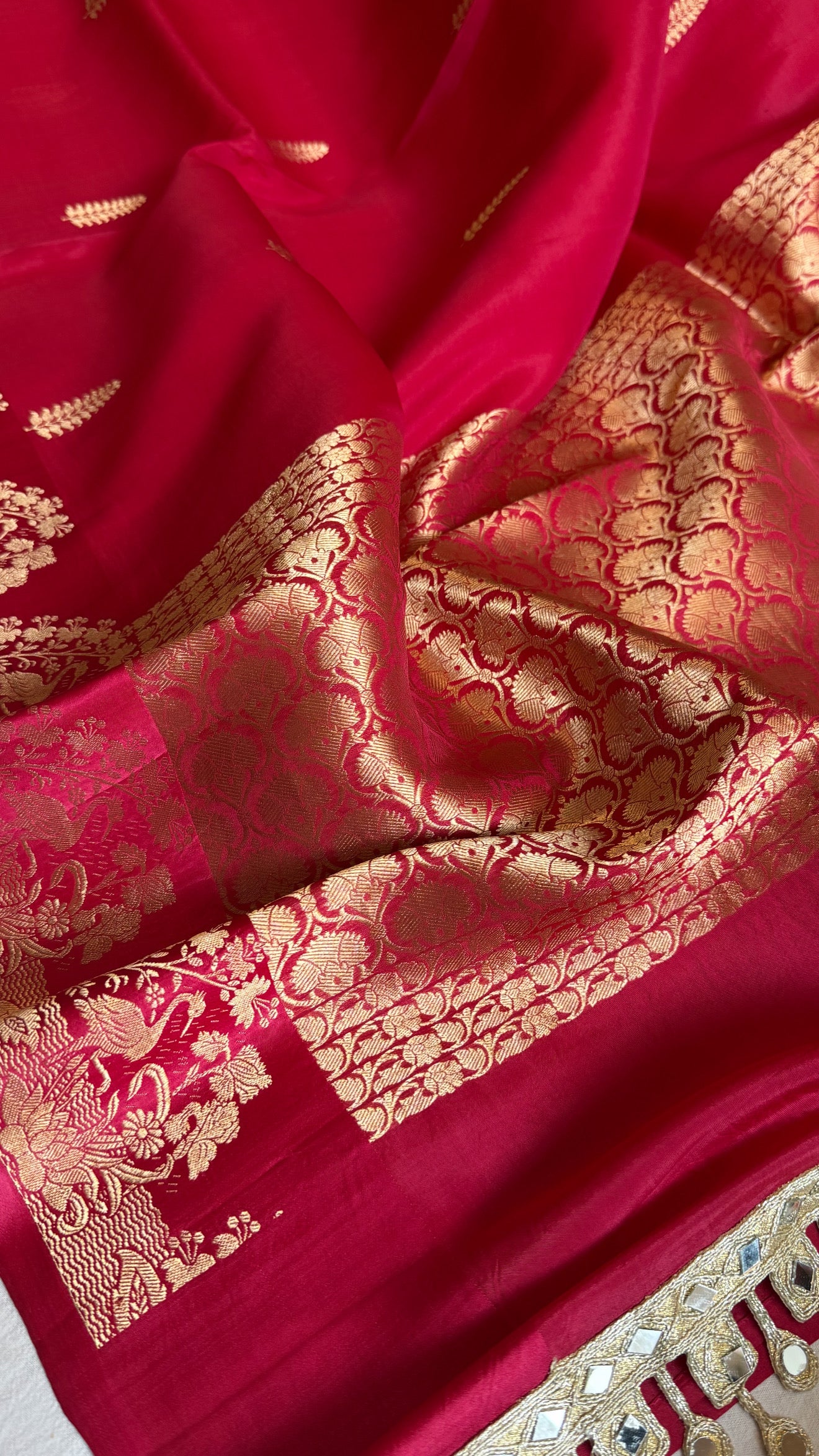 Rani pink banarasi kora silk hand embroidered kadhwa saree