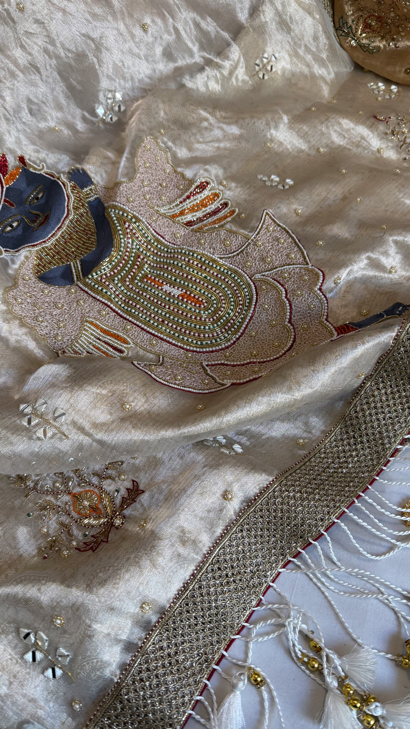 Shrinathji motif inspired diamond silver tissue brocade kadhwa weaving hand embroidered saree