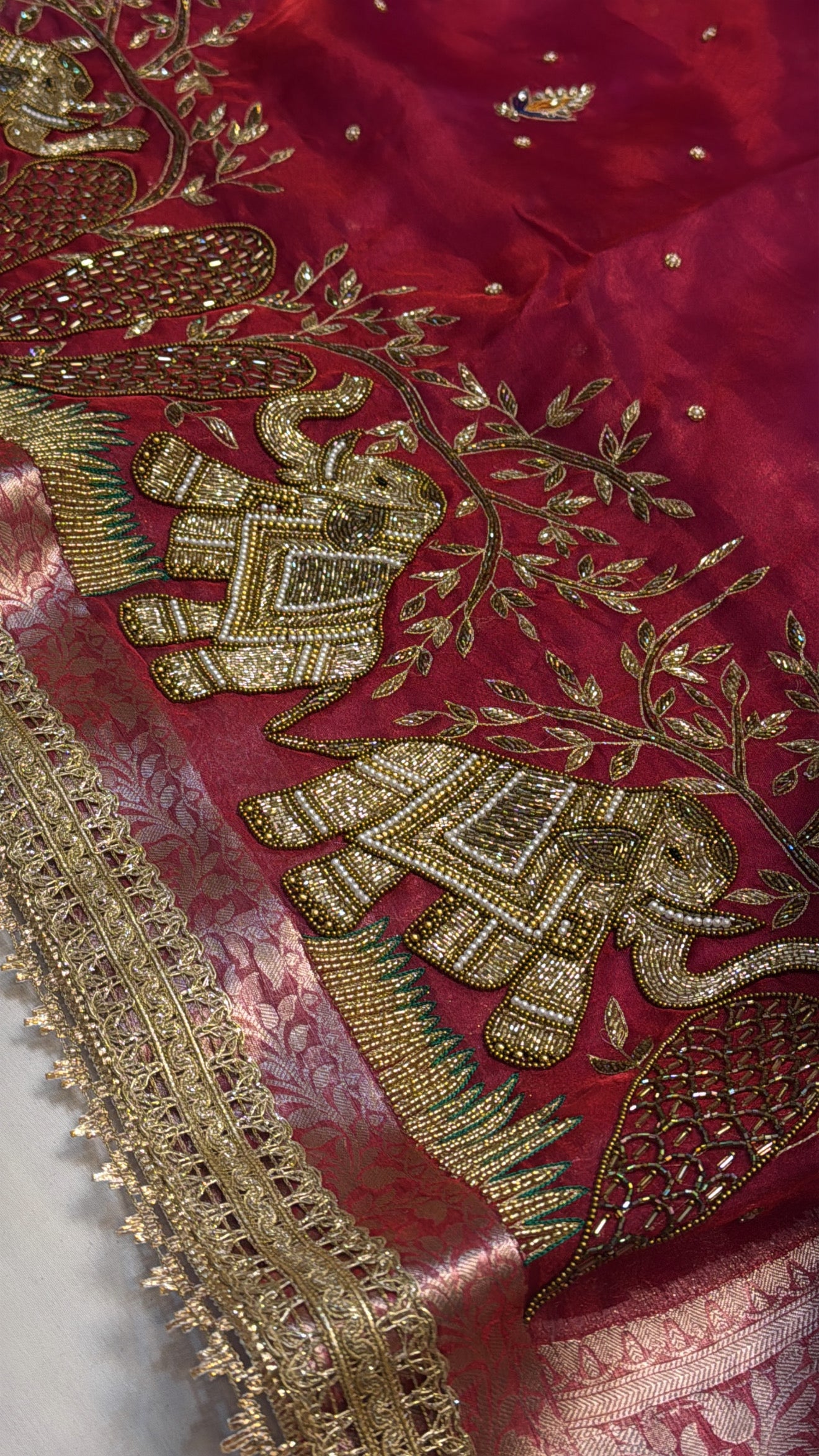 Dulhan ka joda husn red tissue silk hand embroidered saree