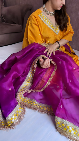 Haldi yellow-purple stitched hand embroidered kadhwa silk suit set from vyaah wala ghar edit