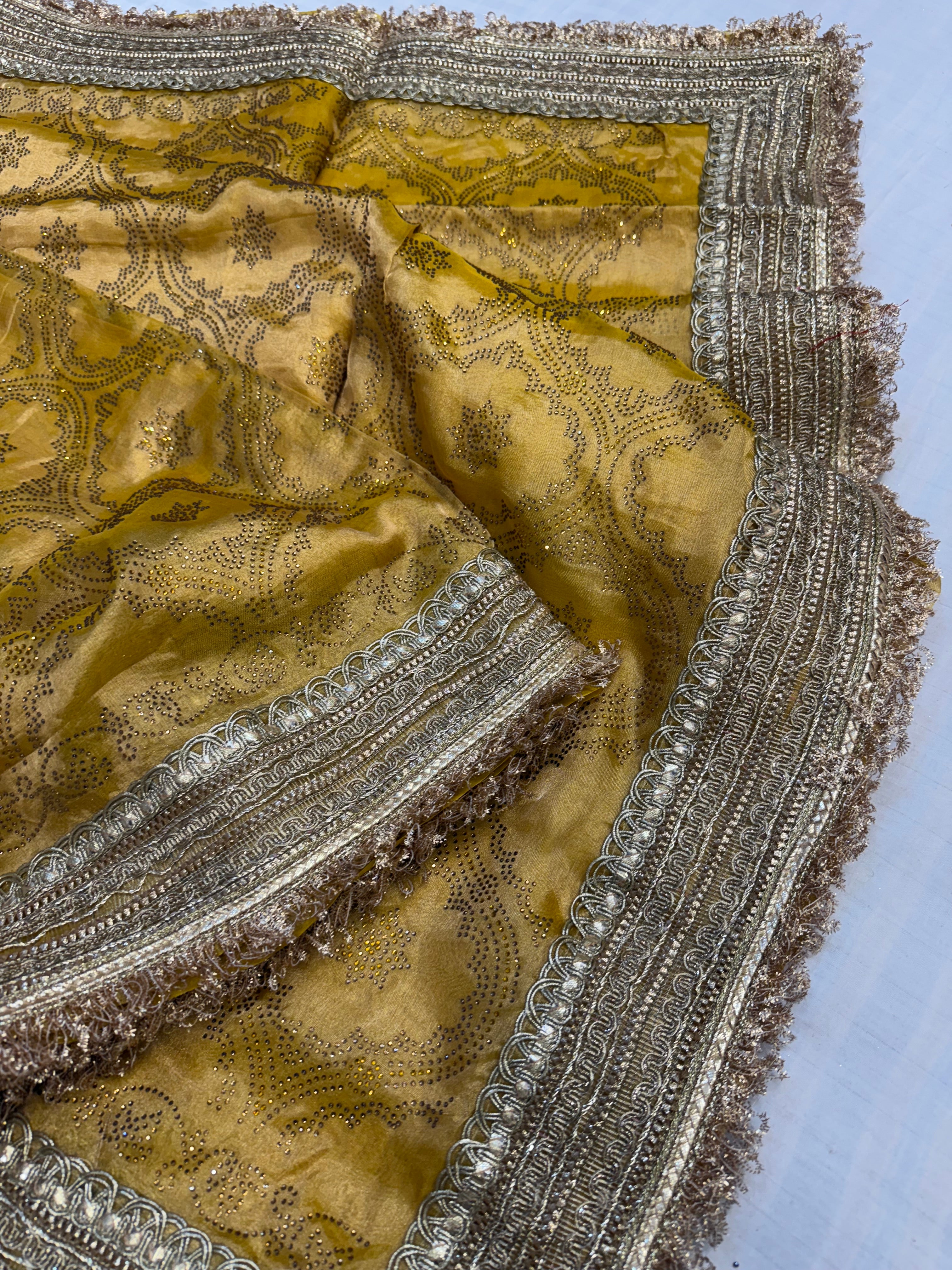 Sitara stonework haldi yellow tissue silk gotapatti saree