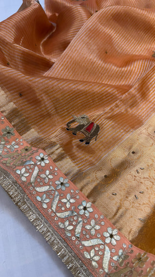 Baarat wali sarees - Chuski orange husn tissue silk elephant motif hand embroidered saree