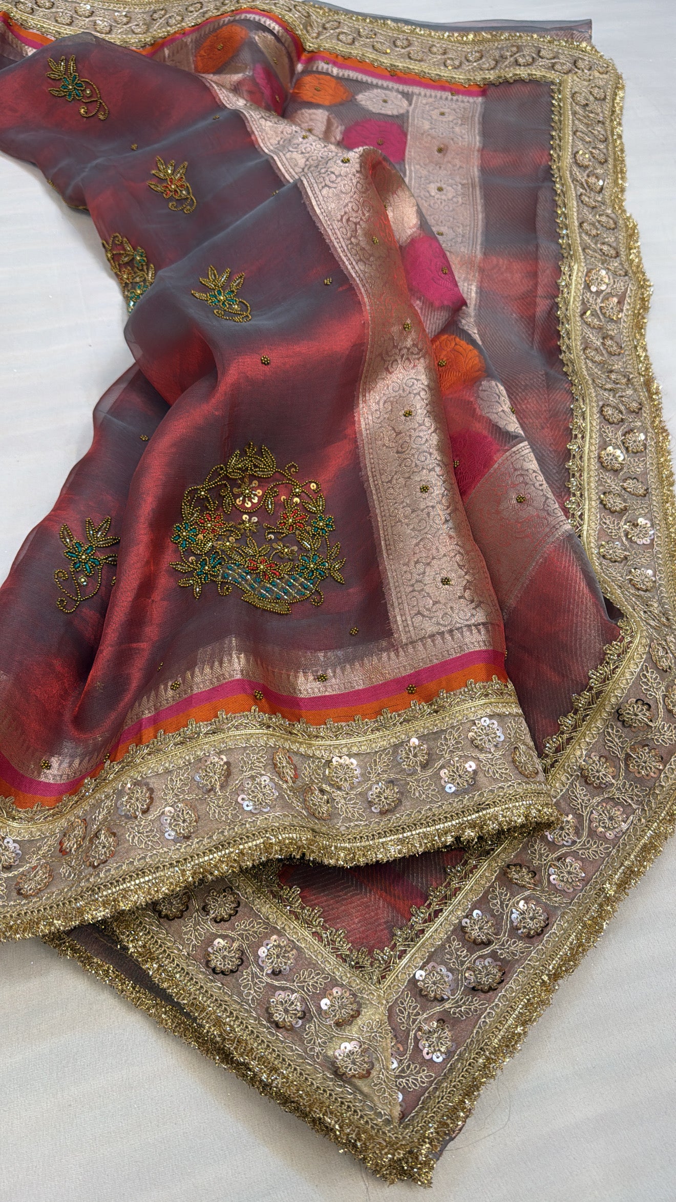 Husn dusty red antique zari hand embroidered tissue silk saree
