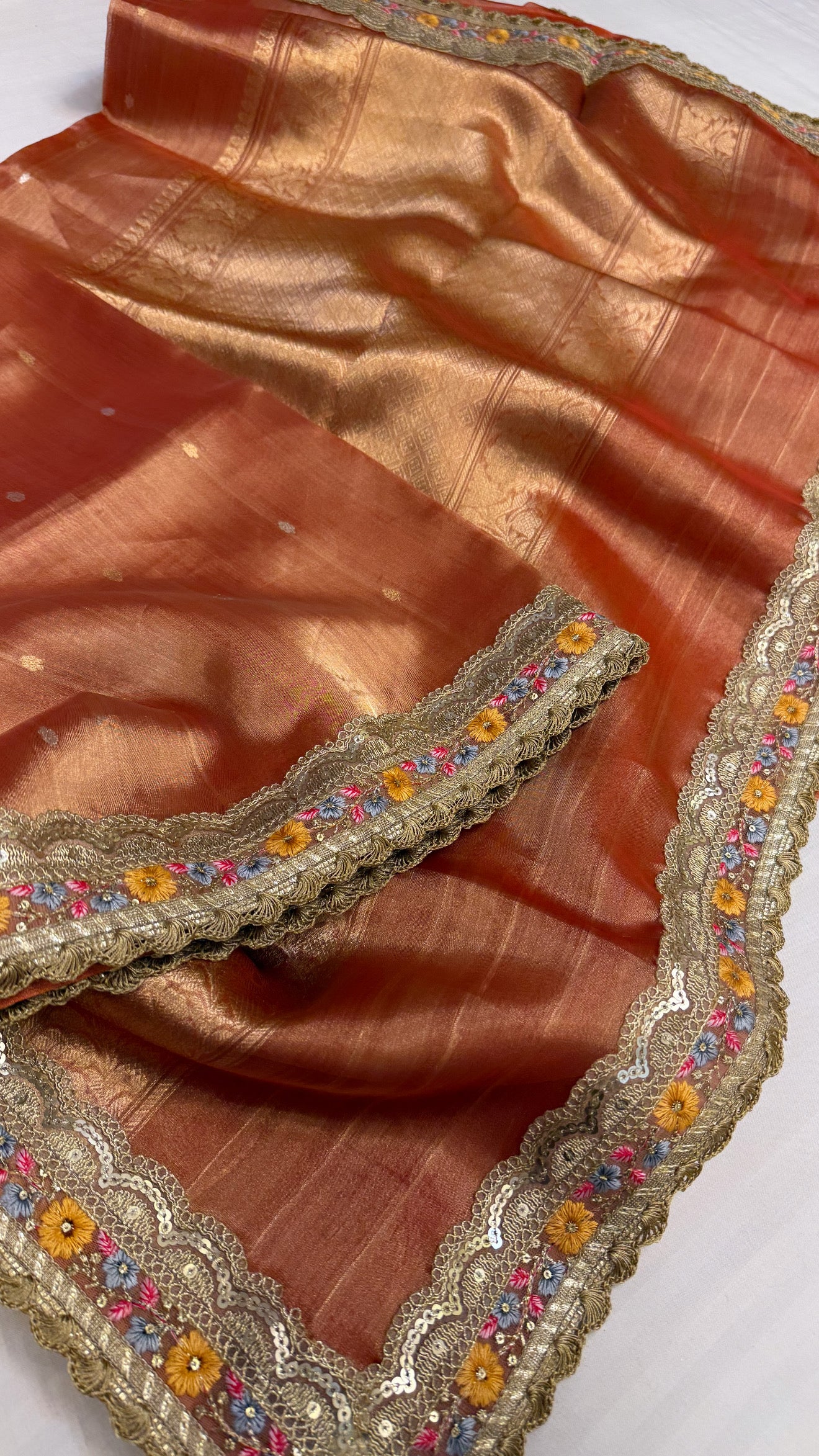 Maharani tangerine red tissue silk saree