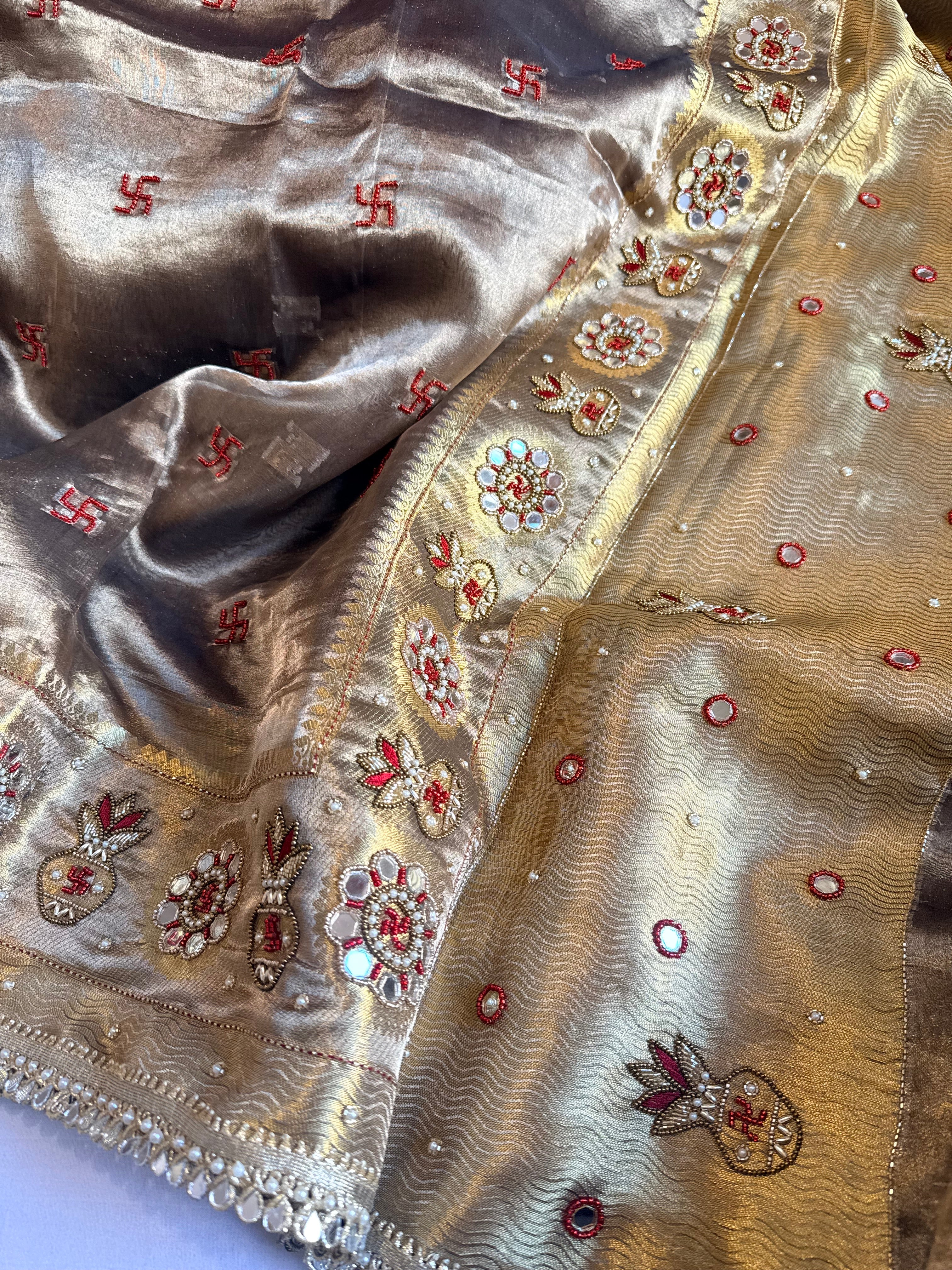 Nayi bahu wali saree edit - Molten gold tissue silk kalash and swastik hand embroidered mirror work saree