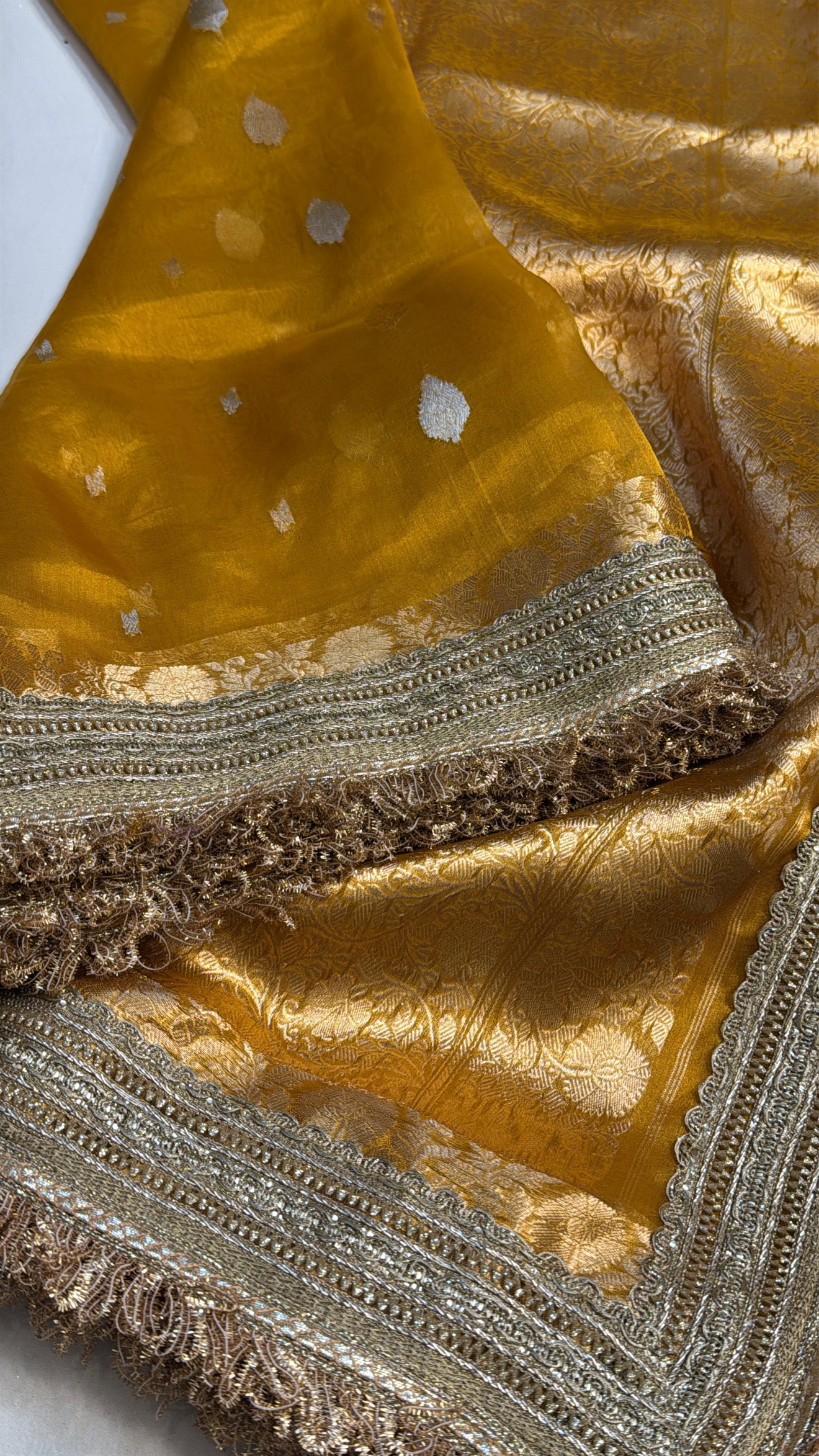 Maharani deep haldi yellow tissue silk kadhwa buti saree