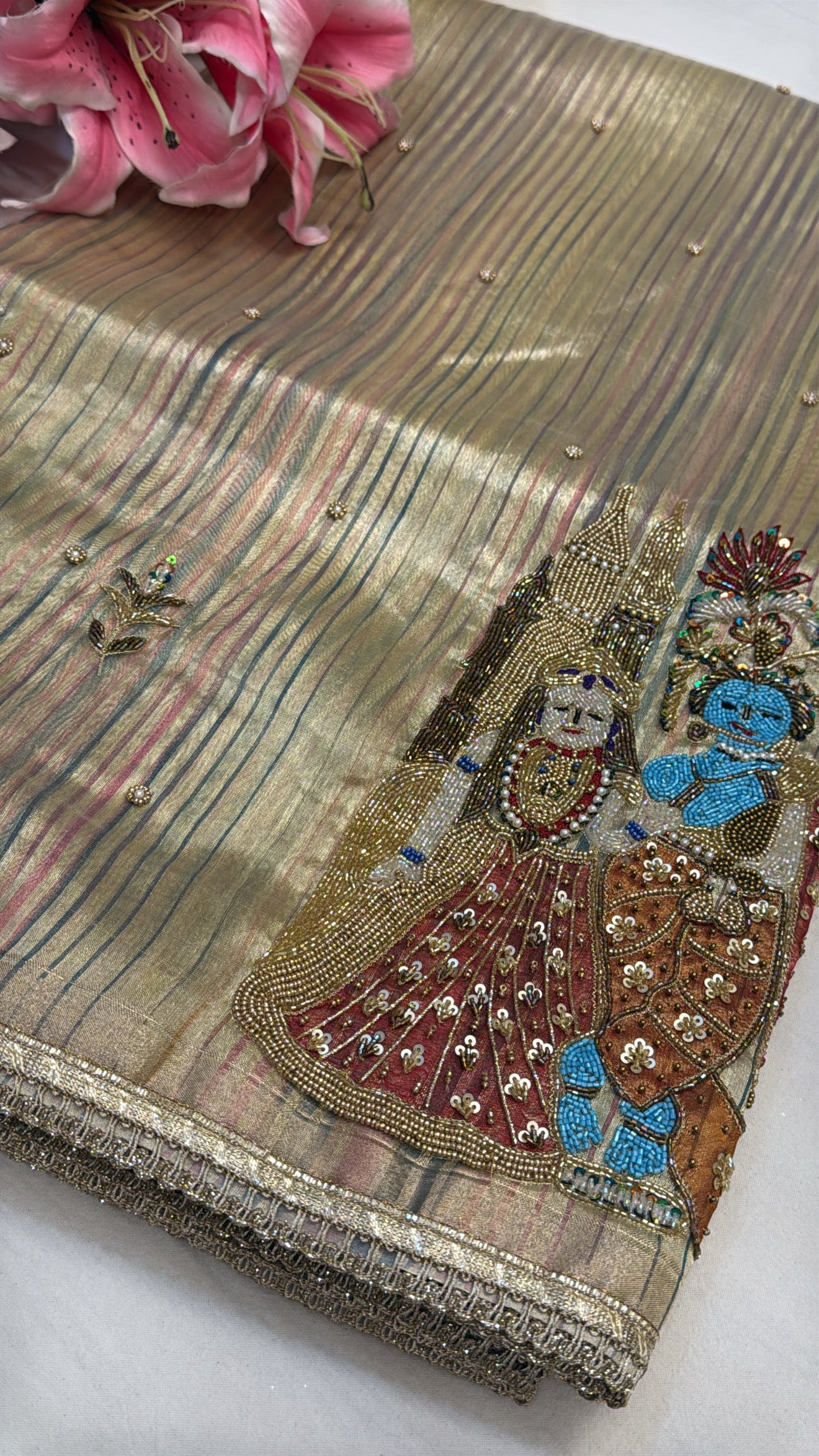 Rasleela tissue silk striped husn hand embroidered kadhwa saree