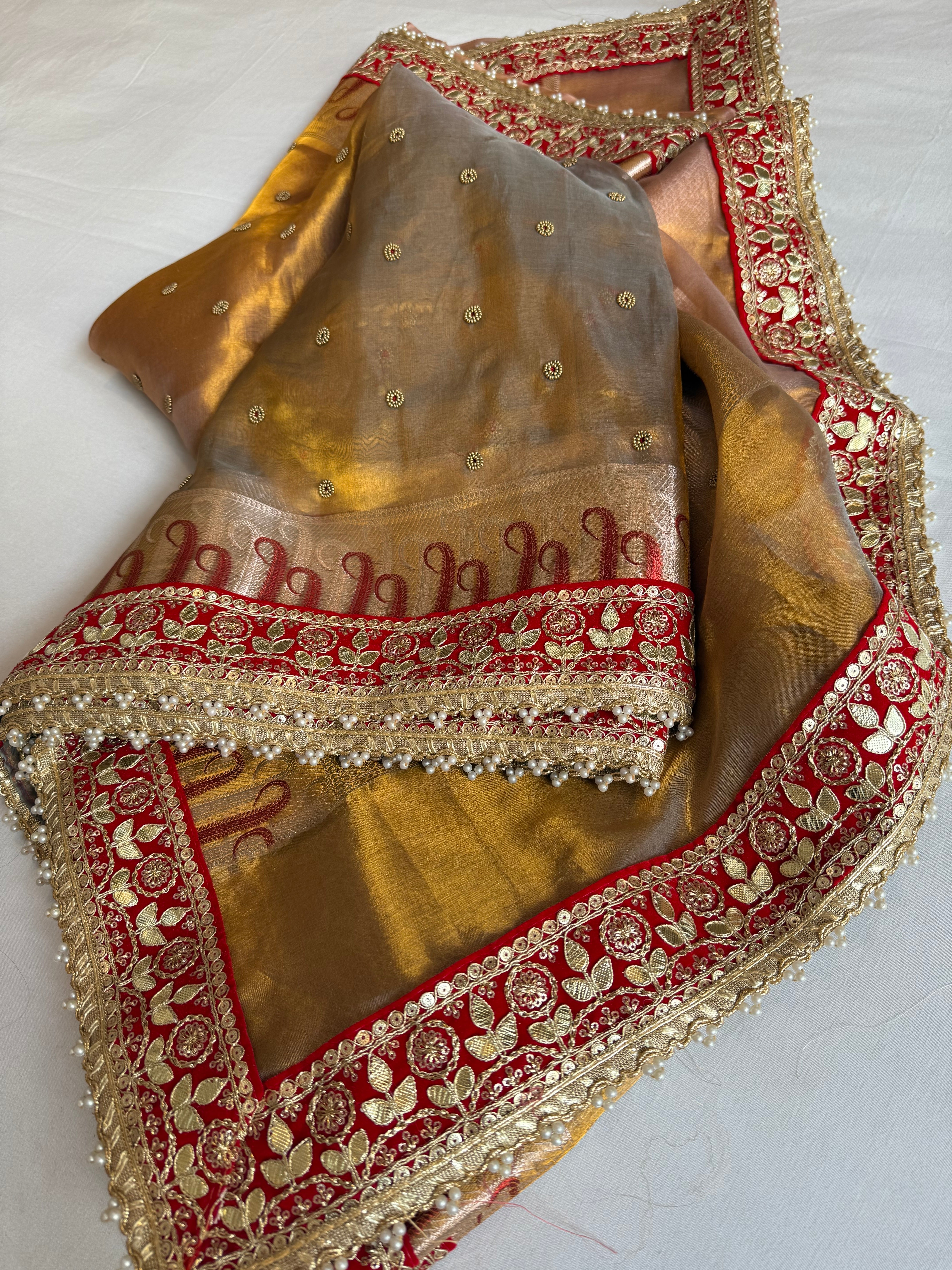 Kanjivaram gold tissue silk red meenakari hand embroidered kadhwa saree
