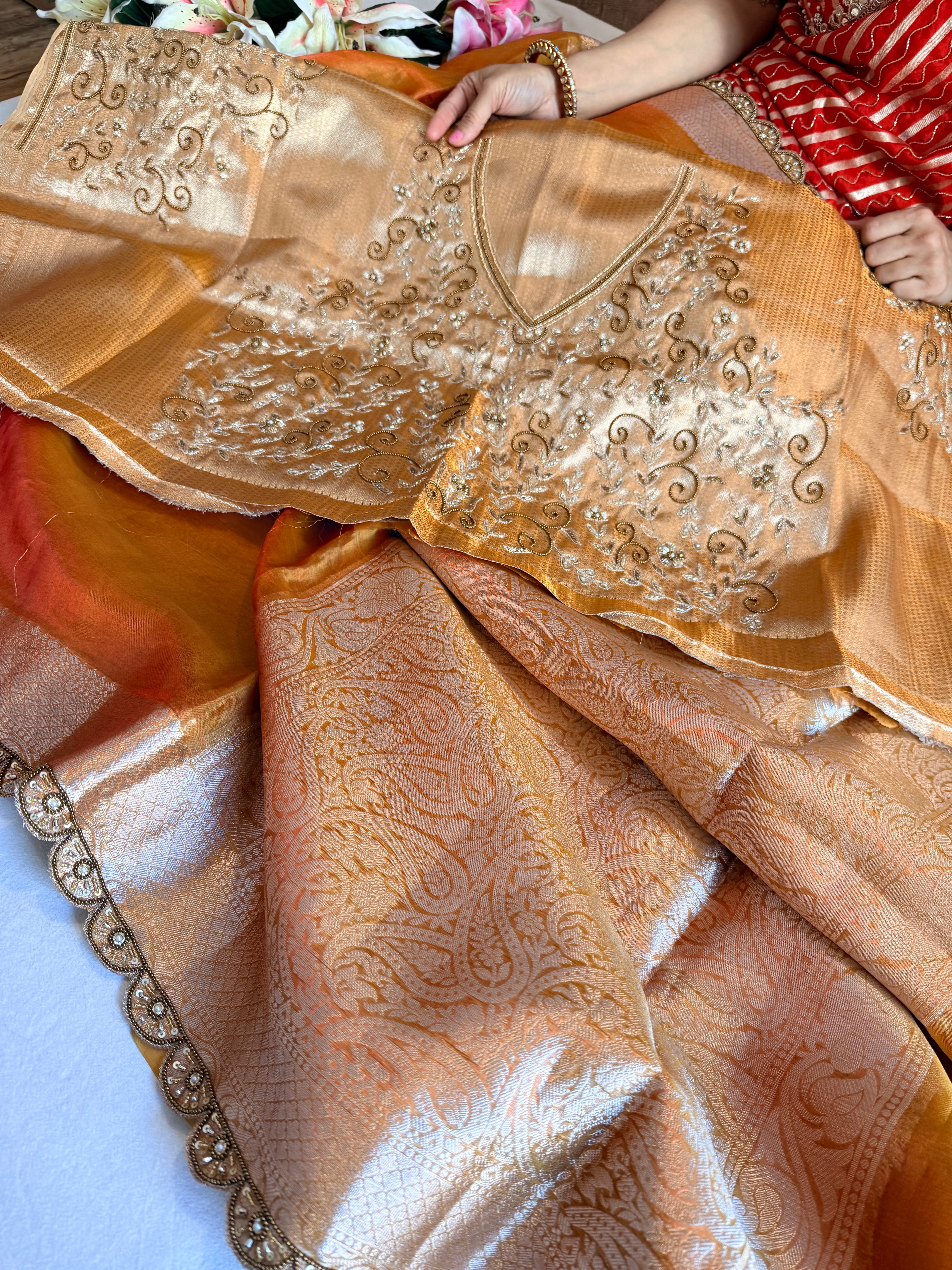 Sunset orange husn tissue silk hand embroidered saree with heavy blouse